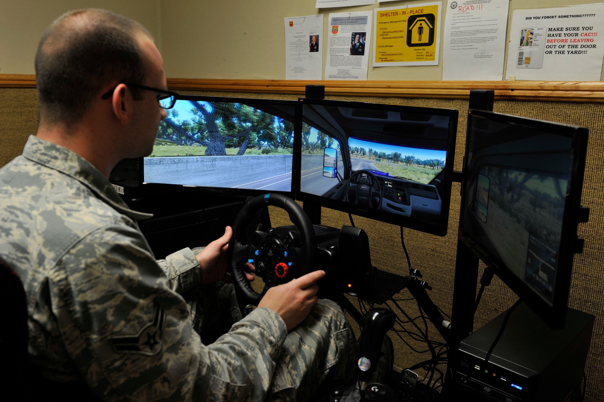 Airman 1st Class Larry Key, 56th Logistics Readiness Squadron vehicle operator dispatcher, trains on a driving simulator at Luke Air Force Base, Ariz., March 6, 2018. The simulator helps Airmen practice their skills without safety risks. (U.S. Air Force Photo by Senior Airman Pedro Mota)
