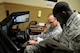Airman 1st Class Larry Key, 56th Logistics Readiness Squadron vehicle operator dispatcher, and Senior Airman D’Andre Prempeh, 56th LRS vehicle operator trainer, review a lesson plan at Luke Air Force Base, Ariz., March 6, 2018.  The lesson plan supplements training on vehicle maneuvers practiced in the driving simulator.  
(U.S. Air Force Photo by Senior Airman Pedro Mota)