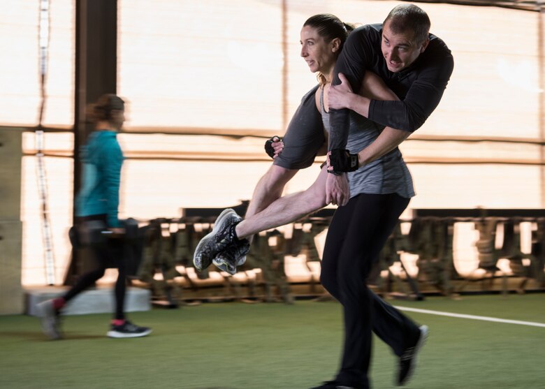 A participant in the Maltz Challenge performs a 100-meter firefighter’s carry at Kirtland Air Force Base, N.M., March 9, 2018. The fitness competition is held annually in honor of U.S. Air Force Master Sgt. Michael Maltz and other fallen heroes. (U.S. Air Force photo by Staff Sgt. J.D. Strong II)