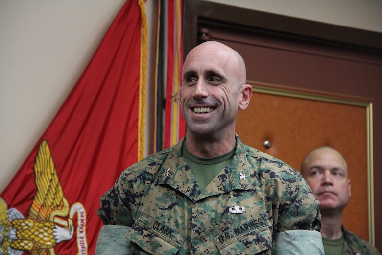Col. William P. Clark, deputy commander of U.S. Marine Corps Forces Korea, smiles at his award ceremony here, March 15, 2018. Maj. Gen. James W. Lukeman, assistant chief of staff of Plans and Policy for United Nations Command, Combined Forces Command, and U.S. Forces Korea, said Clark impacted the lives of Marines everywhere he went during his successful quarter-century career in the Marine Corps. (Official U.S. Marine Corps Photo by Sgt. Nathaniel Hanscom/Released)
