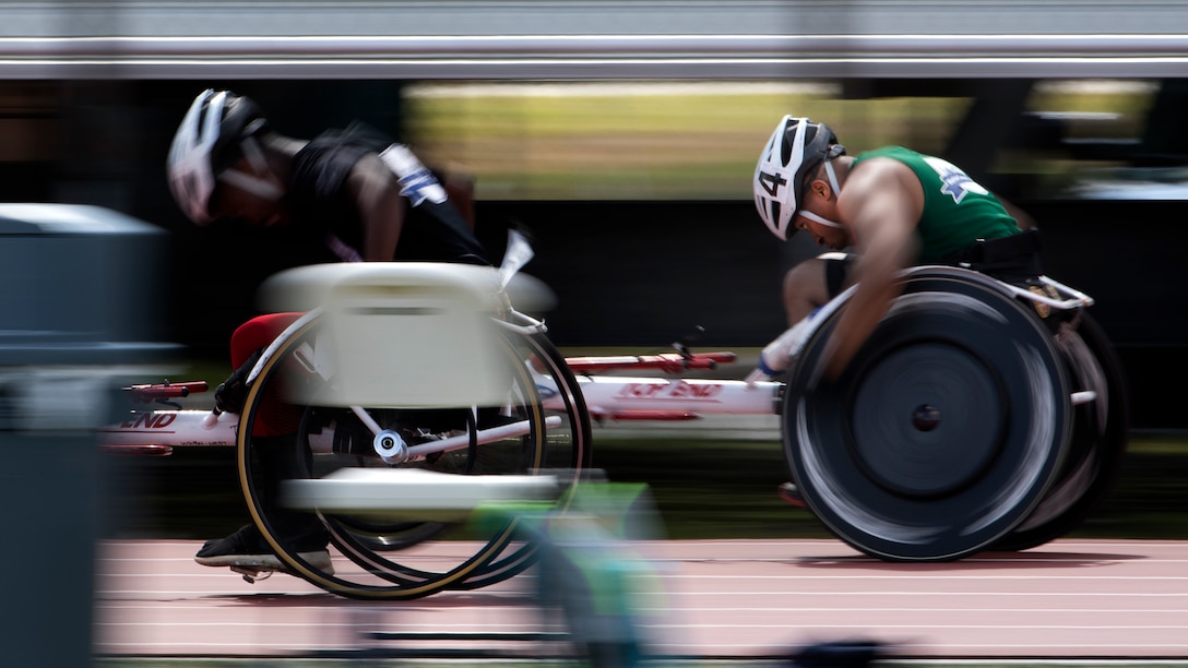 U.S. Marine Corps athletes compete in the 100-meter wheelchair race during the 2018 Marine Corps Trials track competition at Marine Corps Base Camp Lejeune, N.C., March 20, 2018. The Marine Corps Trials promotes recovery and rehabilitation through adaptive sport participation and develops camaraderie among recovering service members and veterans. It is an opportunity for RSMs to demonstrate their achievements and serves as the primary venue to select Marine Corps participants for the DoD Warrior Games.