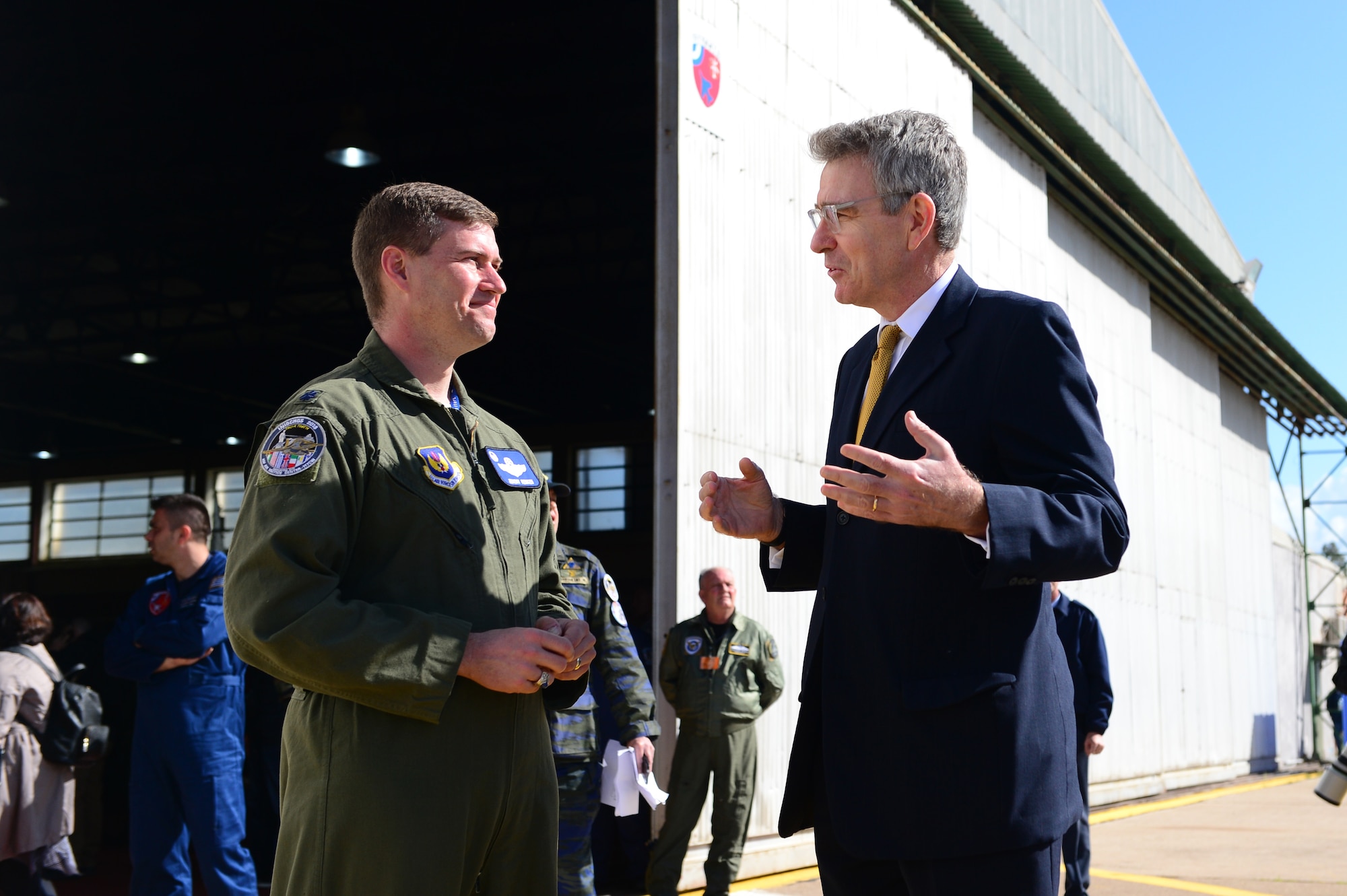 U.S. Ambassador Geoffrey Pyatt discusses INIOHOS 18 with Lt. Col. Jeremy Renken, 492nd Fighter Squadron commander, during the exercise’s media day at Andravida Air Base, Greece, March 20, 2018. Seventy-six fighter aircraft are participating in this year’s iteration of the exercise. (U.S. Air Force photo/1st Lt. Elias Small)