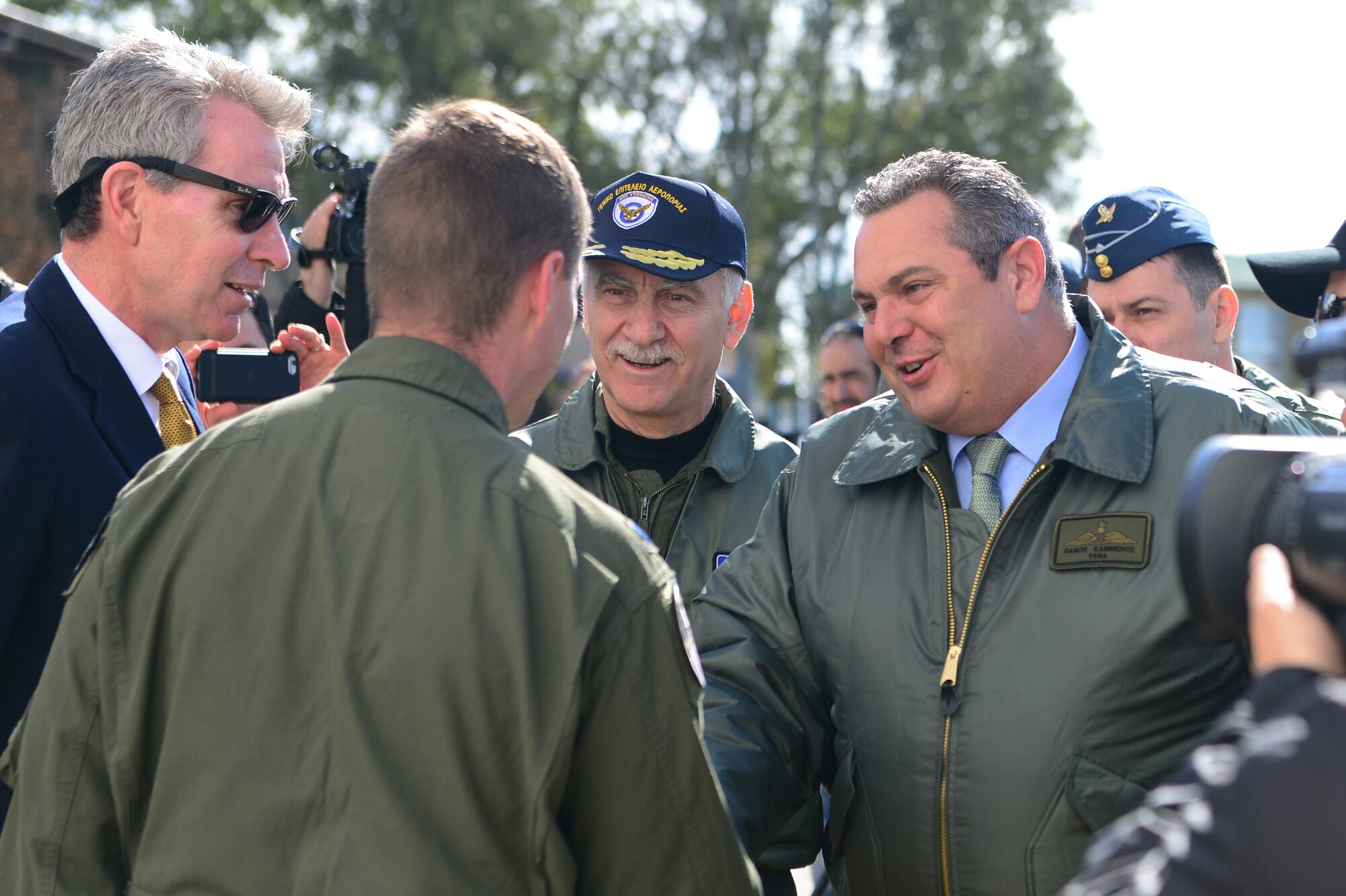 Lt. Col. Jeremy Renken, 492nd Fighter Squadron commander, shakes hands with Greek Minister of Defence Panos Kammenos during an INIOHOS 18 media event at Andravida Air Base, Greece, March 20, 2018. INIOHOS 18 is a Hellenic Air Force-led, large force flying exercise focused on strengthening partnerships and interoperability.
(U.S. Air Force photo/1st Lt. Elias Small)