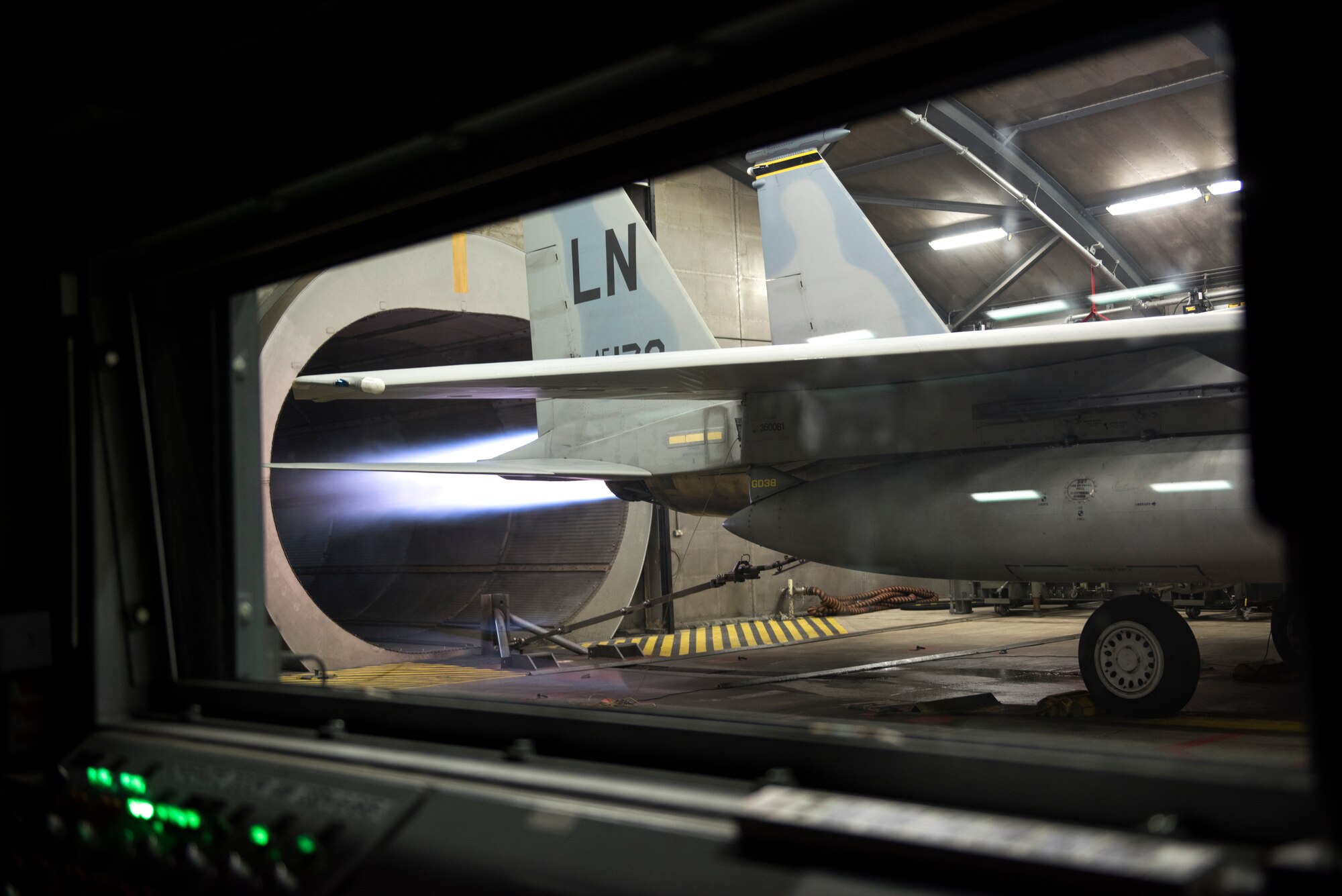 An F-15C Eagle undergoes an engine run test at Royal Air Force Lakenheath, England, Mar. 8. Engines are tested inside of hush houses to minimize noise and provide a safe area for maintainers to inspect them. (U.S. Air Force photo/Senior Airman Malcolm Mayfield)