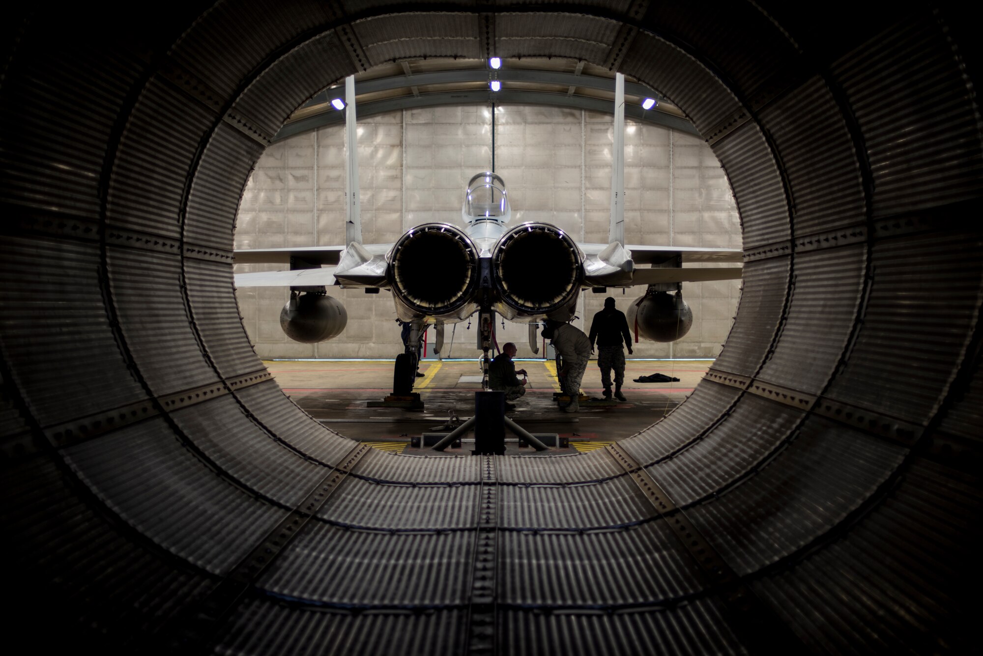 48th Maintenance Group Airmen prepare an F-15C for an engine run at Royal Air Force Lakenheath, England, Mar. 8. Engine runs are conducted as part of a series of tests to ensure aircraft can support the 48th Fighter Wings warfighting capability. (U.S. Air Force photo/Senior Airman Malcolm Mayfield)