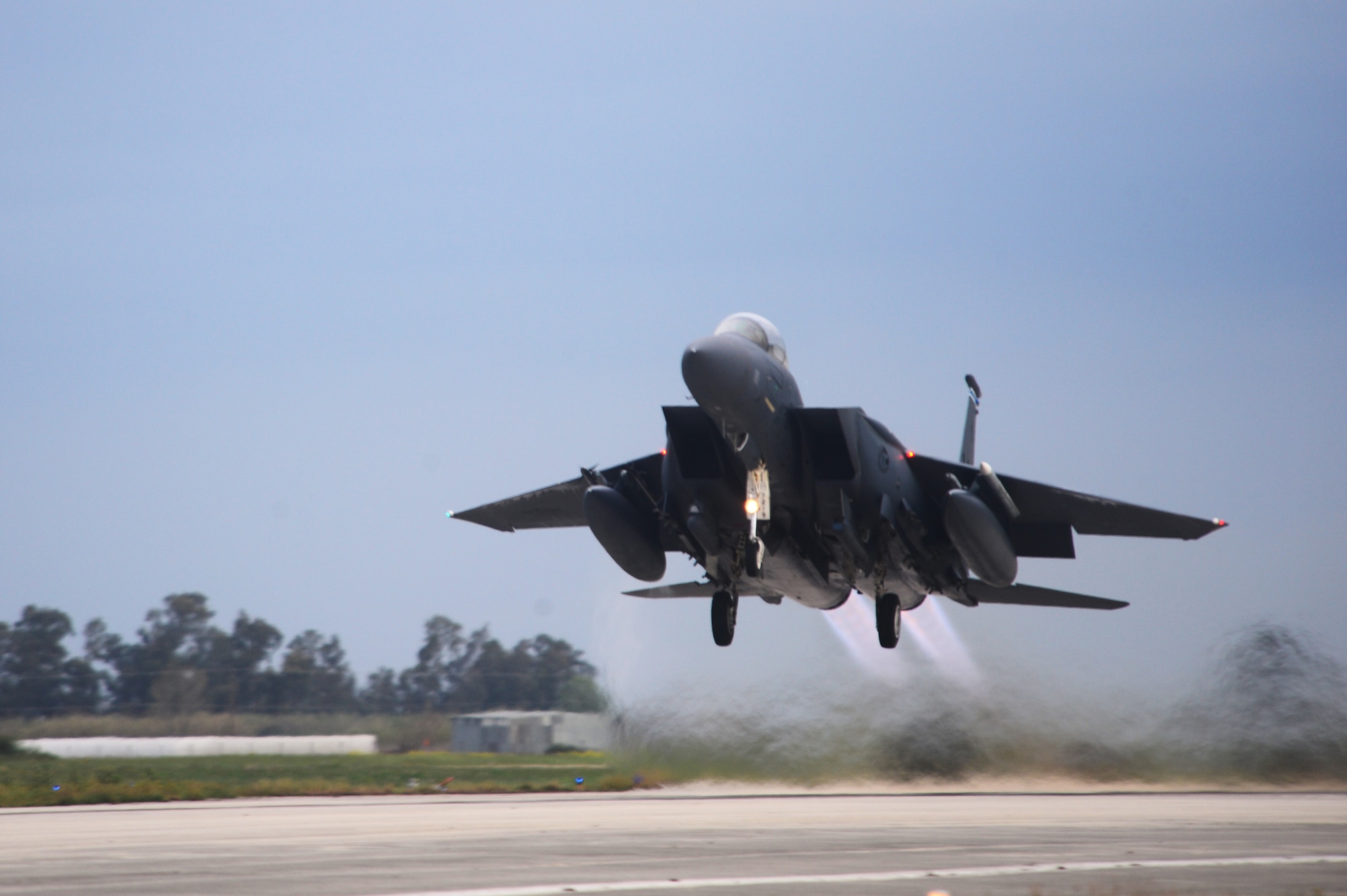 An F-15E Strike Eagle assigned to the 492nd Fighter Squadron, Royal Air Force Lakenheath, England takes off from Andravida Air Base, Greece, March 21, 2018, during exercise INIOHOS 18. The 492nd FS is flying alongside Hellenic Air Force airmen and other partners and Allies during the exercise to increase interoperability and strengthen partnerships. (U.S. Air Force photo/1st Lt. Elias Small)