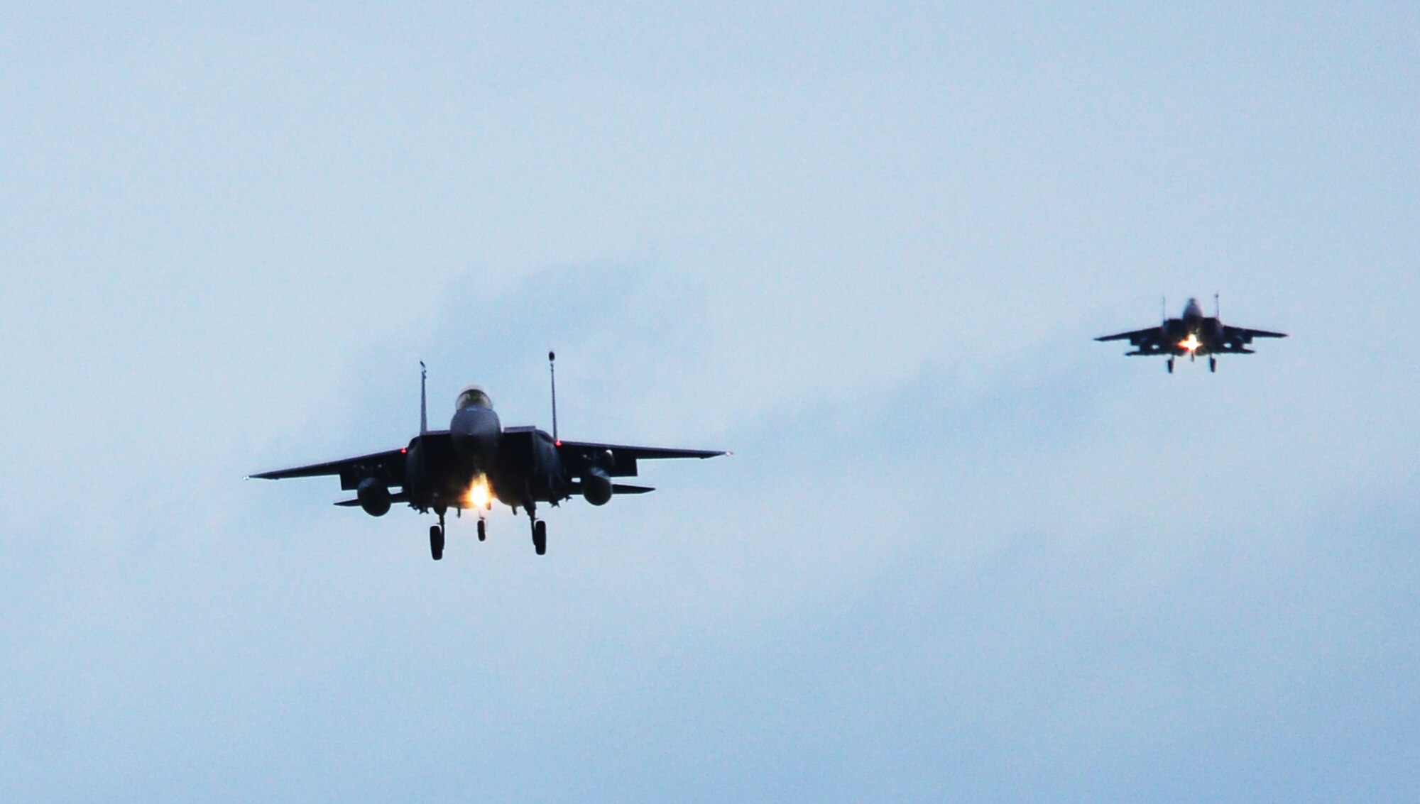 Two F-15E Strike Eagles assigned to the 492nd Fighter Squadron, Royal Air Force Lakenheath, England approach the runway at Andravida Air Base, Greece, March 21, 2018, during exercise INIOHOS 18. Thirteen 492nd FS F-15Es are participating in the Hellenic Air Force-led multinational exercise. (U.S. Air Force photo/1st Lt. Elias Small)