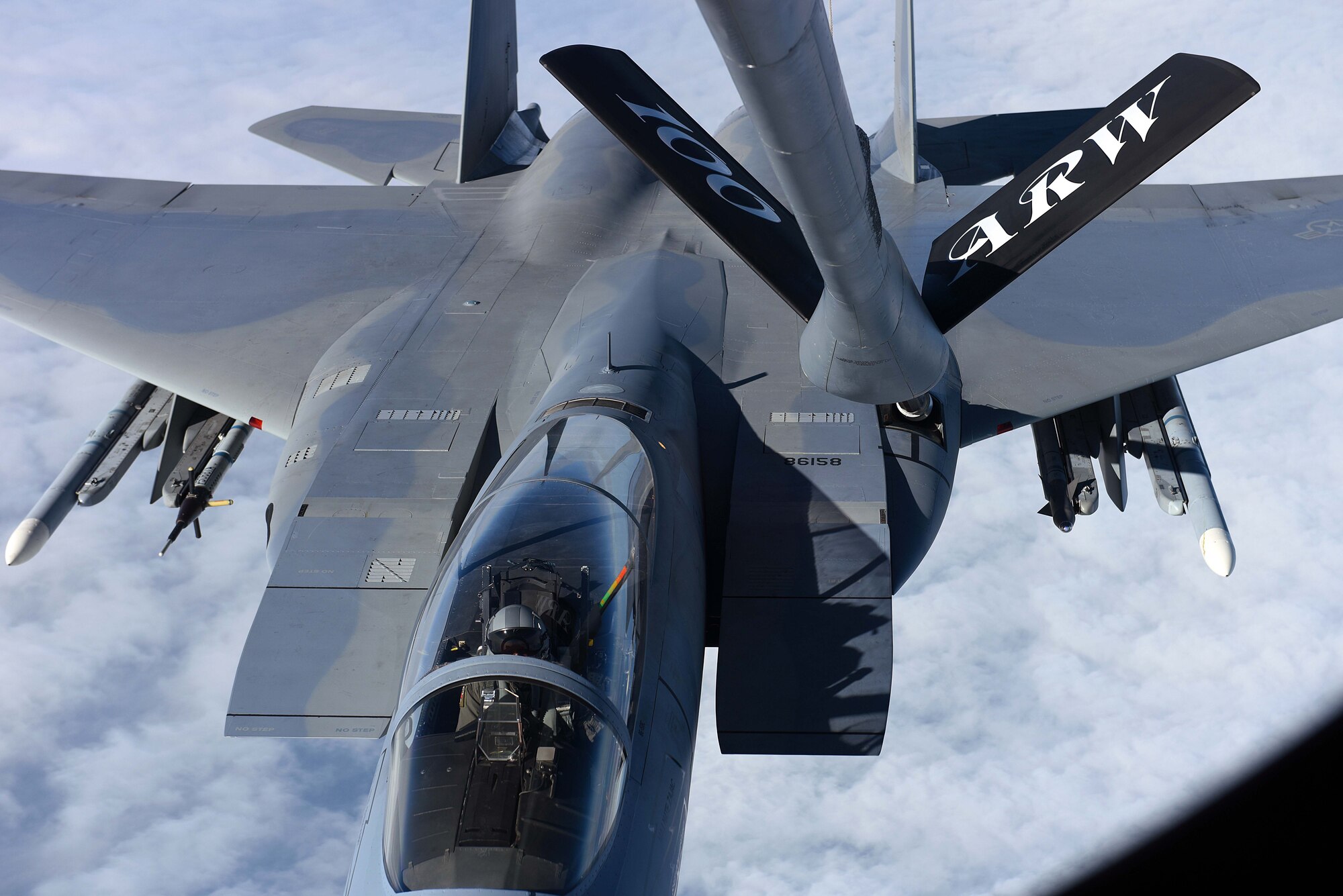A U.S. Air Force F-15C Eagle receives fuel from a U.S. Air Force KC-135 Stratotanker during an aerial refueling training mission March 21, 2018, over the Netherlands. The F-15Cs deployed from the 142nd Fighter Wing, Portland, Oregon, and the 104th Fighter Wing, Westfield, Massachusetts, are operating from Leeuwarden Air Base, Netherlands, as part of a Theater Security Package in support of Operation Atlantic Resolve. (U.S. Air Force photo by Senior Airman Luke Milano)