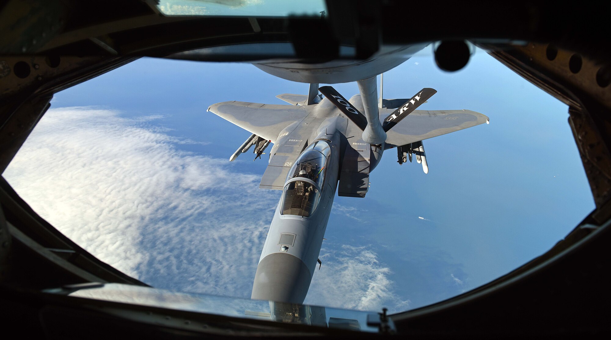 A U.S. Air Force F-15C Eagles receives fuel from a U.S. Air Force KC-135 Stratotanker during an aerial refueling training mission March 21, 2018, over the Netherlands. The F-15Cs deployed from the 142nd Fighter Wing, Portland, Oregon, and the 104th Fighter Wing, Westfield, Massachusetts, are operating from Leeuwarden Air Base, Netherlands, as part of a Theater Security Package in support of Operation Atlantic Resolve. (U.S. Air Force photo by Senior Airman Luke Milano)