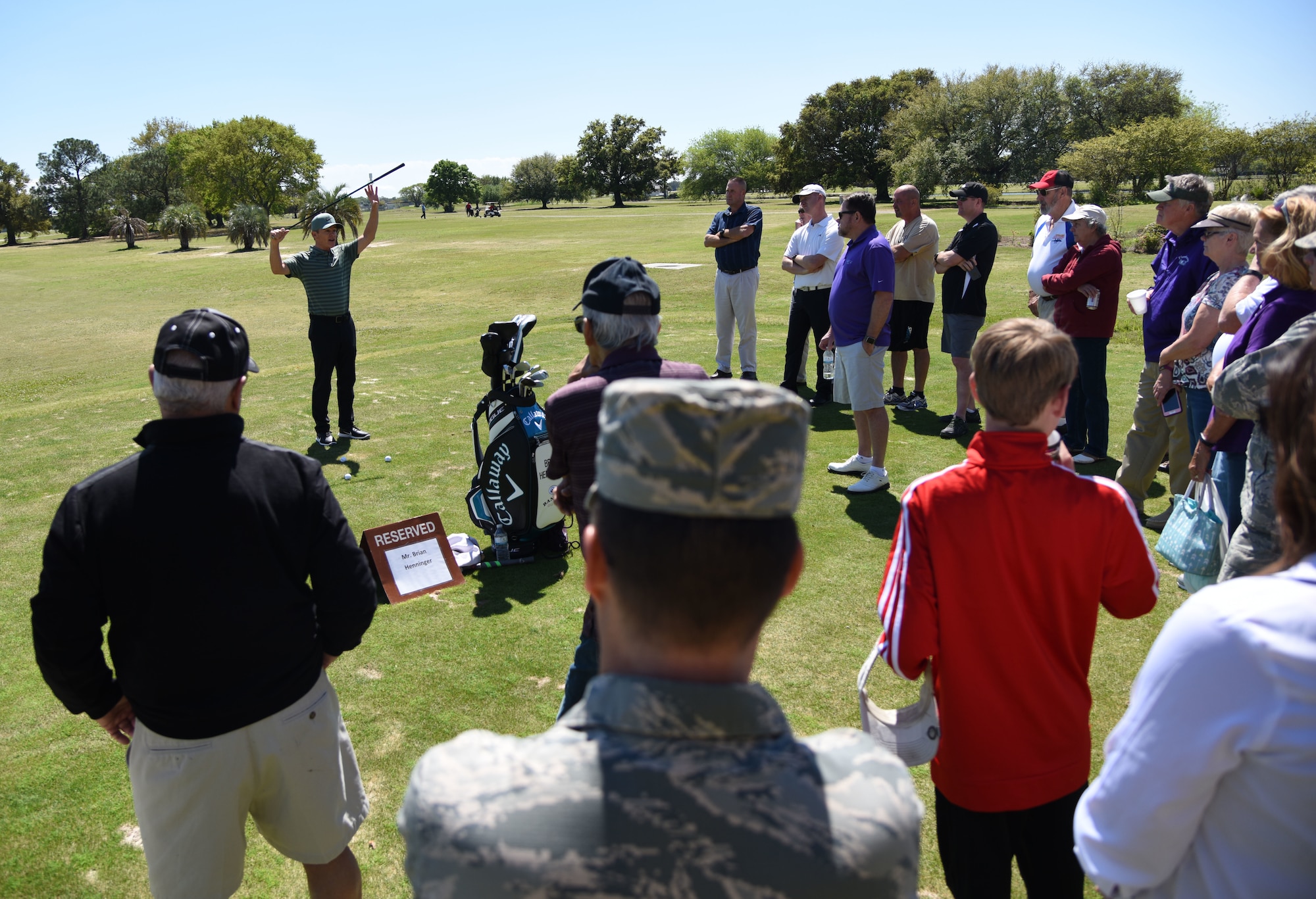 Brian Henninger, Professional Golfers’ Association champion player, provides golfing tips to Keesler personnel during a free clinic at the Bay Breeze Golf Course March 20, 2018, on Keesler Air Force Base, Mississippi. Henninger is a two-time PGA and three-time nationwide tour champion and this is the first time he has held a clinic at Keesler. (U.S. Air Force photo by Kemberly Groue)