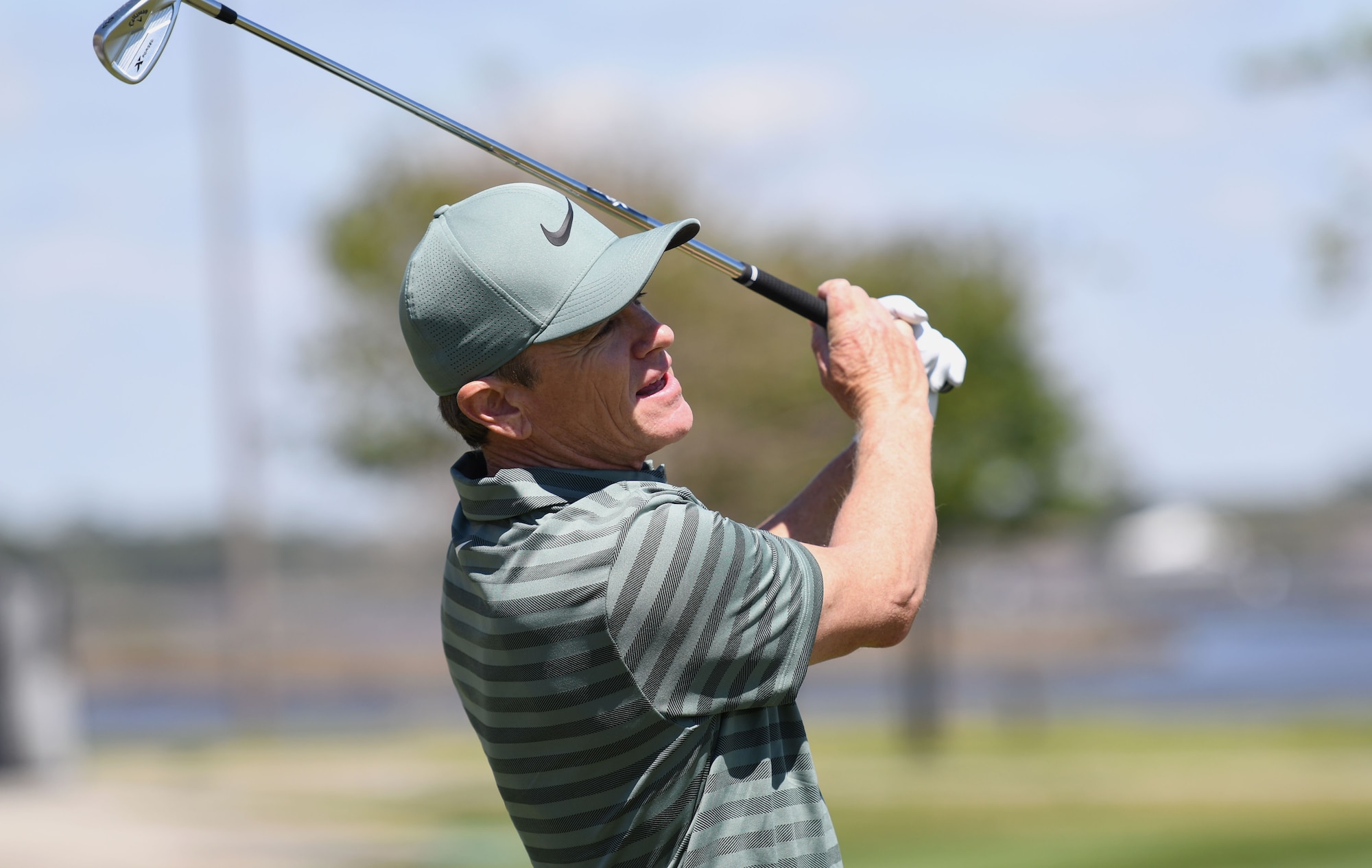Brian Henninger, Professional Golfers’ Association champion player, demonstrates his golf club swing during a free clinic at the Bay Breeze Golf Course March 20, 2018, on Keesler Air Force Base, Mississippi. Henninger is a two-time PGA and three-time nationwide tour champion and this is the first time he has held a clinic at Keesler. (U.S. Air Force photo by Kemberly Groue)