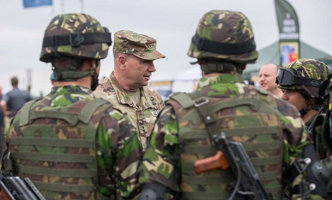 U.S. Army Lt. Gen. Ben Hodges, Commander, U.S. Army Europe, speaks with some Lithuanian soldiers