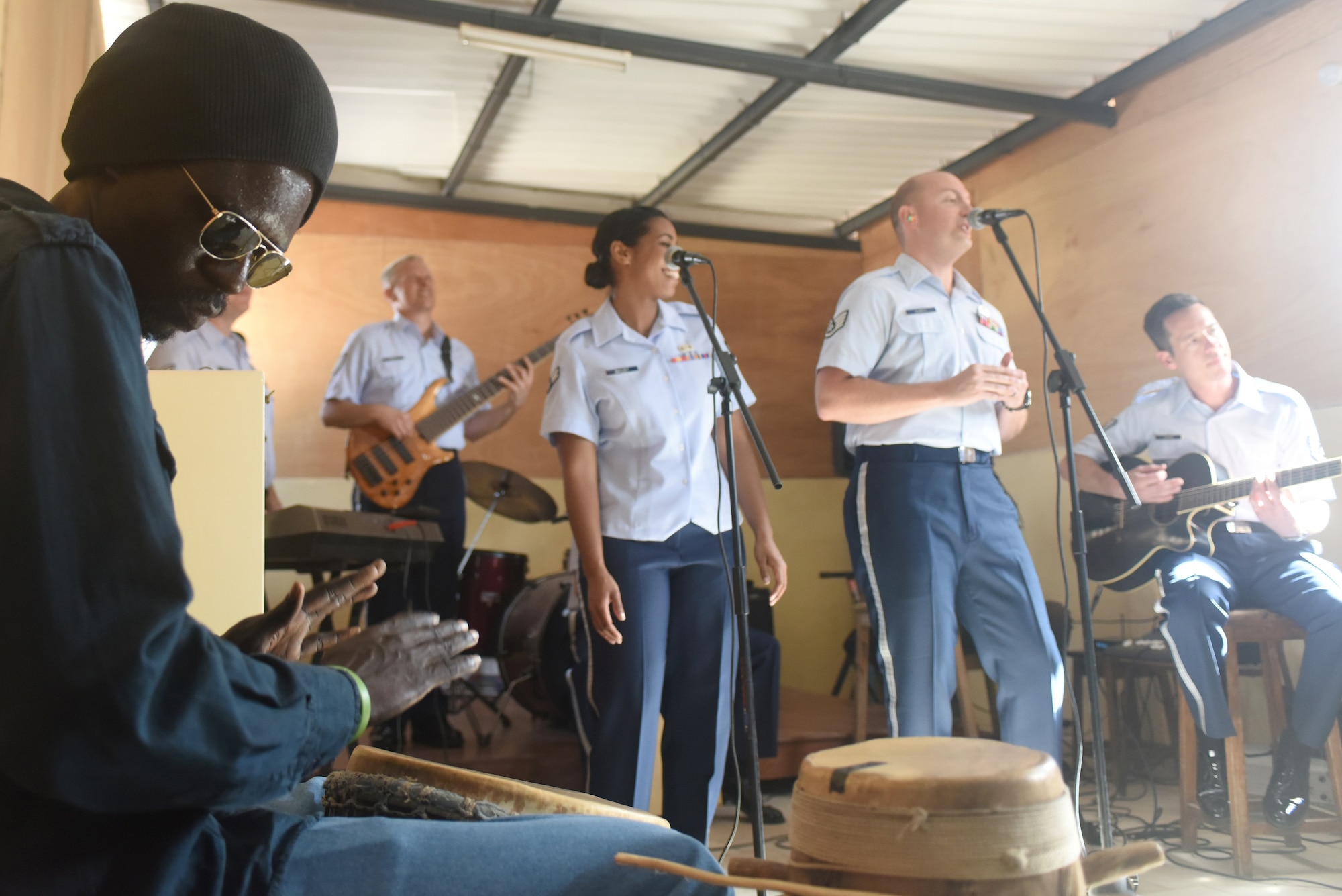 A student plays along with the U.S. Air Forces in Europe Band at the National School of the Arts in Dakar, Senegal, March 21, 2018. The USAFE Band assists in building relationships through community engagement and outreach. (U.S. Air Force photo by Airman 1st Class Eli Chevalier)