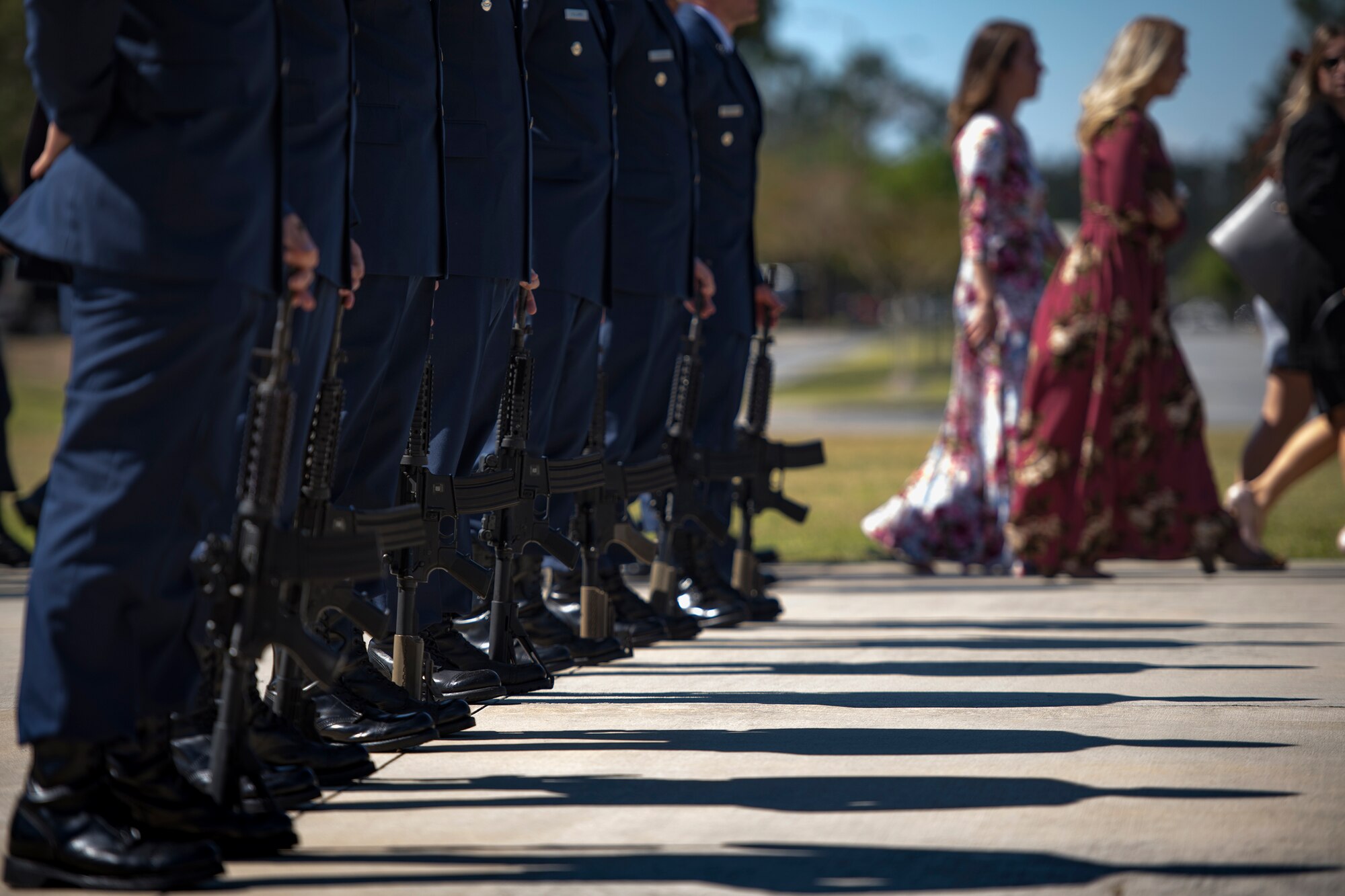 Pararescuemen from the 38th Rescue Squadron stand ready to render a 21-gun salute following a memorial service in honor of Capt. Mark Weber, March 21, 2018, at Moody Air Force Base, Ga. Weber, a 38th RQS combat rescue officer and Texas native, was killed in an HH-60G Pave Hawk crash in Anbar Province, Iraq, March 15. During the ceremony, Weber was posthumously awarded a Meritorious Service Medal and the Air Force Commendation Medal. (U.S. Air Force photo by Staff Sgt. Ryan Callaghan)