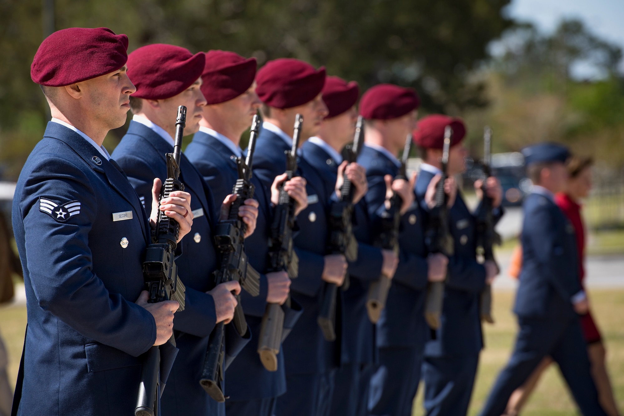 Pararescuemen from the 38th Rescue Squadron stand ready to render a 21-gun salute following a memorial service in honor of Capt. Mark Weber, March 21, 2018, at Moody Air Force Base, Ga. Weber, a 38th RQS combat rescue officer and Texas native, was killed in an HH-60G Pave Hawk crash in Anbar Province, Iraq, March 15. During the ceremony, Weber was posthumously awarded a Meritorious Service Medal and the Air Force Commendation Medal. (U.S. Air Force photo by Staff Sgt. Ryan Callaghan)