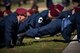 Pararescuemen perform memorial pushups following a memorial service in honor of Capt. Mark Weber, March 21, 2018, at Moody Air Force Base, Ga. Weber, a 38th Rescue Squadron combat rescue officer and Texas native, was killed in an HH-60G Pave Hawk crash in Anbar Province, Iraq, March 15. During the ceremony, Weber was posthumously awarded a Meritorious Service Medal and the Air Force Commendation Medal. (U.S. Air Force photo by Staff Sgt. Ryan Callaghan)