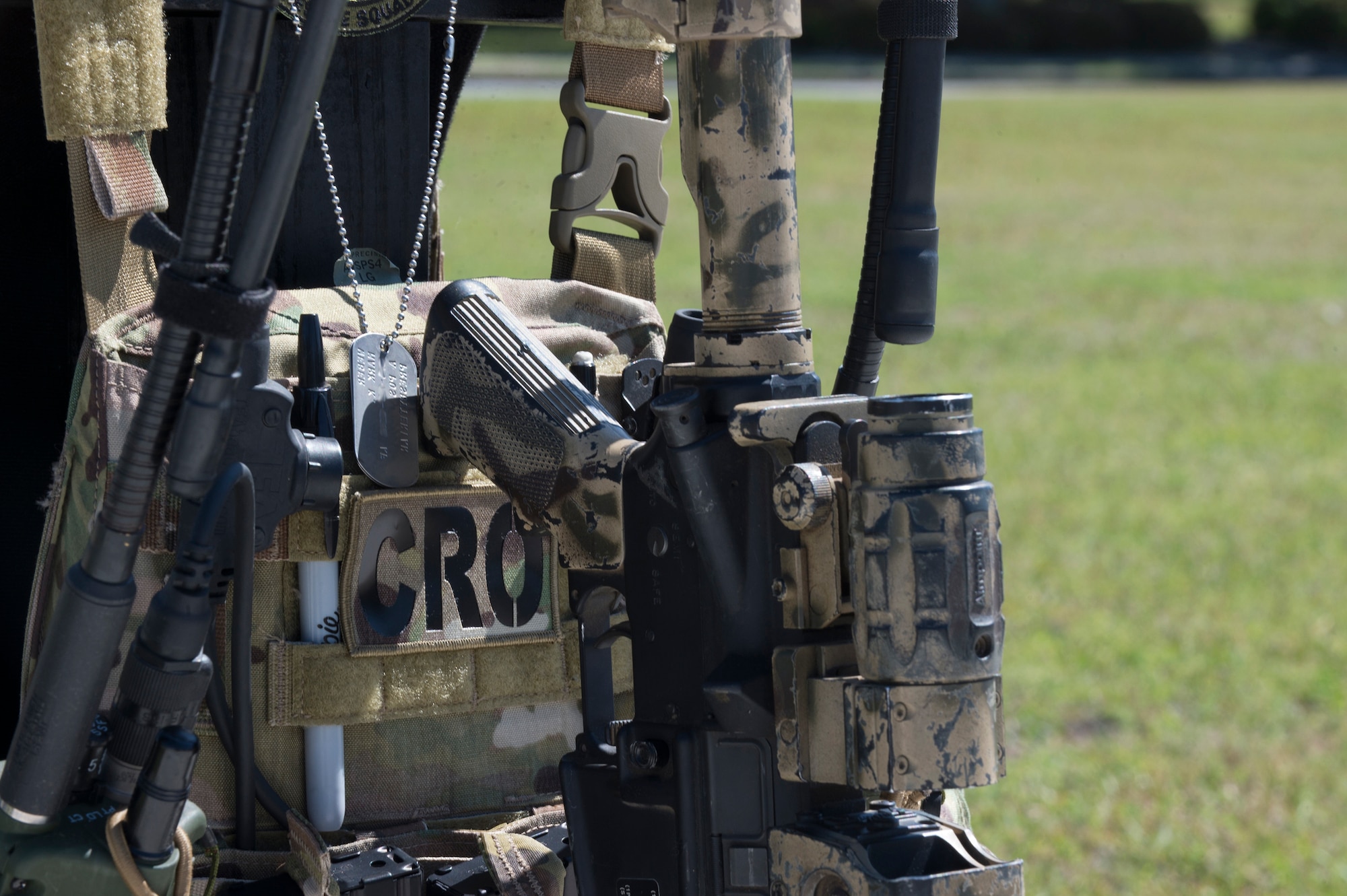 A battlefield cross sits on display following a memorial service in honor of Capt. Mark Weber, March 21, 2018, at Moody Air Force Base, Ga. Weber, a 38th Rescue Squadron combat rescue officer and Texas native, was killed in an HH-60G Pave Hawk crash in Anbar Province, Iraq, March 15. During the ceremony, Weber was posthumously awarded a Meritorious Service Medal and the Air Force Commendation Medal. (U.S. Air Force photo by Andrea Jenkins)