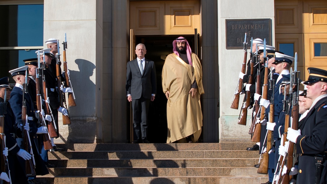 Defense Secretary James N. Mattis stands on the top of a staircase with Saudi Arabian Crown Prince Mohammed bin Salman.