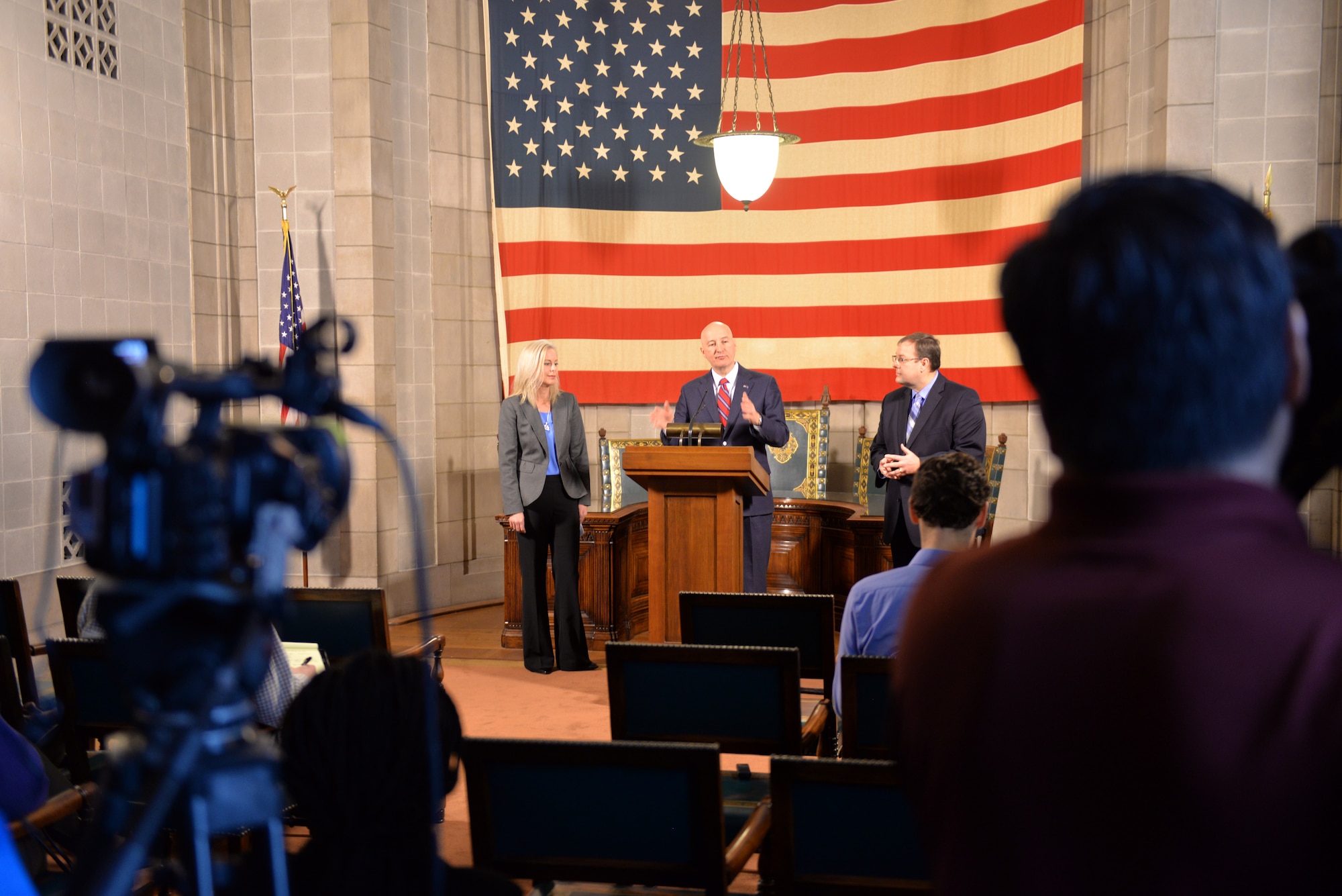Nebraska Gov. Pete Ricketts addresses the media, March 19, 2018, at the Nebraska State Capitol in Lincoln, Nebraska after signing a change to Rule 21, which regulates state teaching licenses,which will make it easier for military spouses to teach immediately if they have recently arrived from out of state.