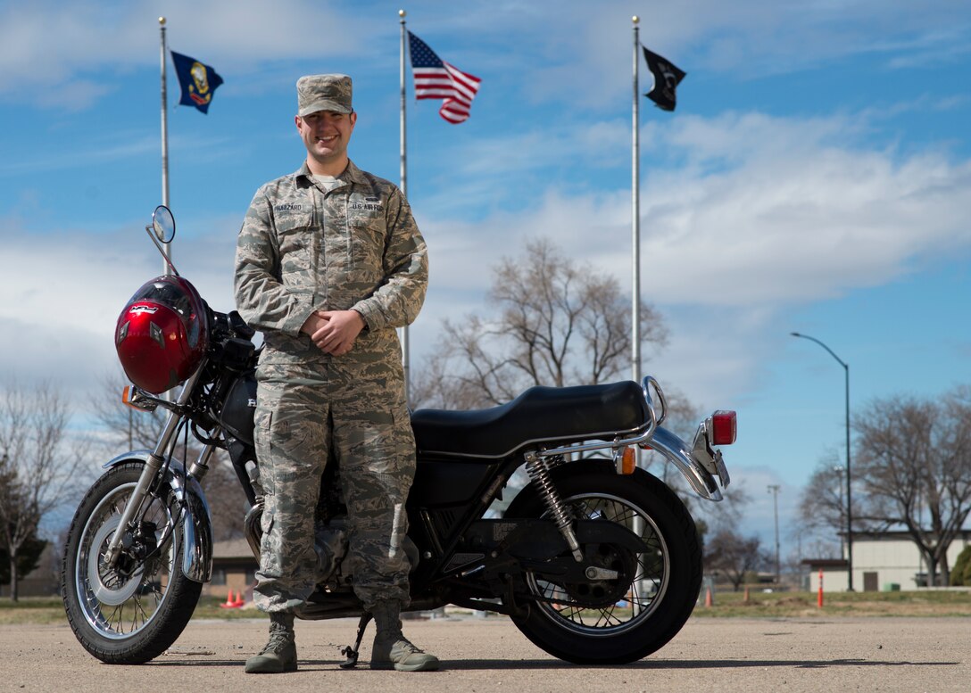 Senior Airman Alexander Hazzard, 366th Communications Squadron motorcycle safety representative, poses with his motorcycle March 21, 2018, at Mountain Home Air Force Base, Idaho. Motorcycle safety representatives use the Motorcycle Unit Safety Tracking Tool to manage how many Airmen ride motorcycles.