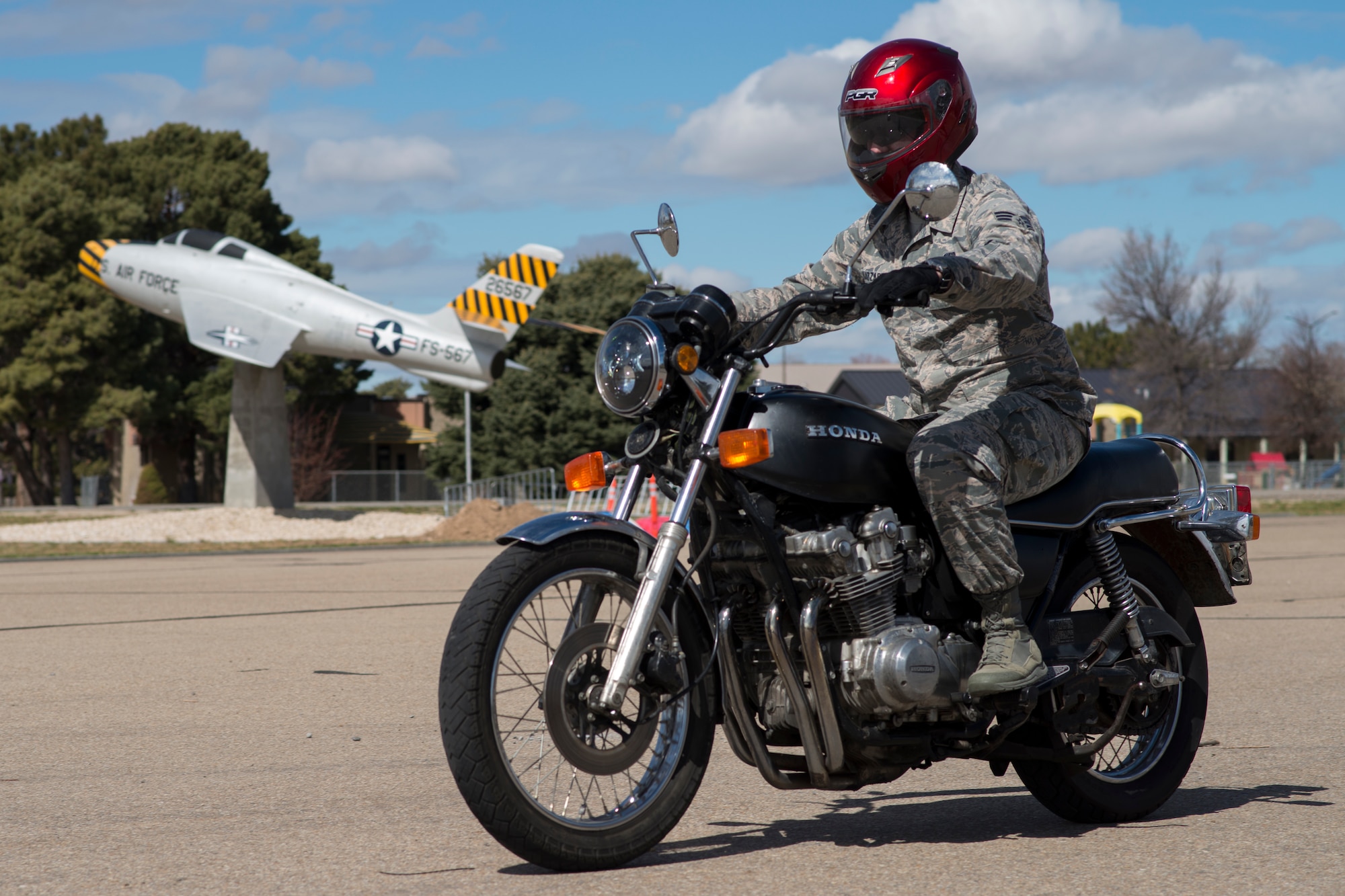 Senior Airman Alexander Hazzard, 366th Communications Squadron motorcycle safety representative, rides his motorcycle through Holt Park March 21, 2018, at Mountain Home Air Force Base, Idaho. The Air Force has extensive rules in place for motorcycle safety to ensure Airmen stay safe on the road.