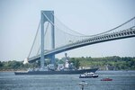 Arleigh Burke-class guided missile destroyer USS Bainbridge (DDG 96) passes under the Verrazano Bridge during a parade of ships in the New York Harbor river to mark the start of 2016 Fleet Week New York. The event Fleet Week New York, now in its 28th year, is the city's time-honored celebration of the sea services. It is an unparalleled opportunity for the citizens of New York and the surrounding tri-state area to meet Sailors, Marines and Coast Guardsmen, as well as witness firsthand the latest capabilities of today's maritime services. The weeklong celebration has been held nearly every year since 1984.
