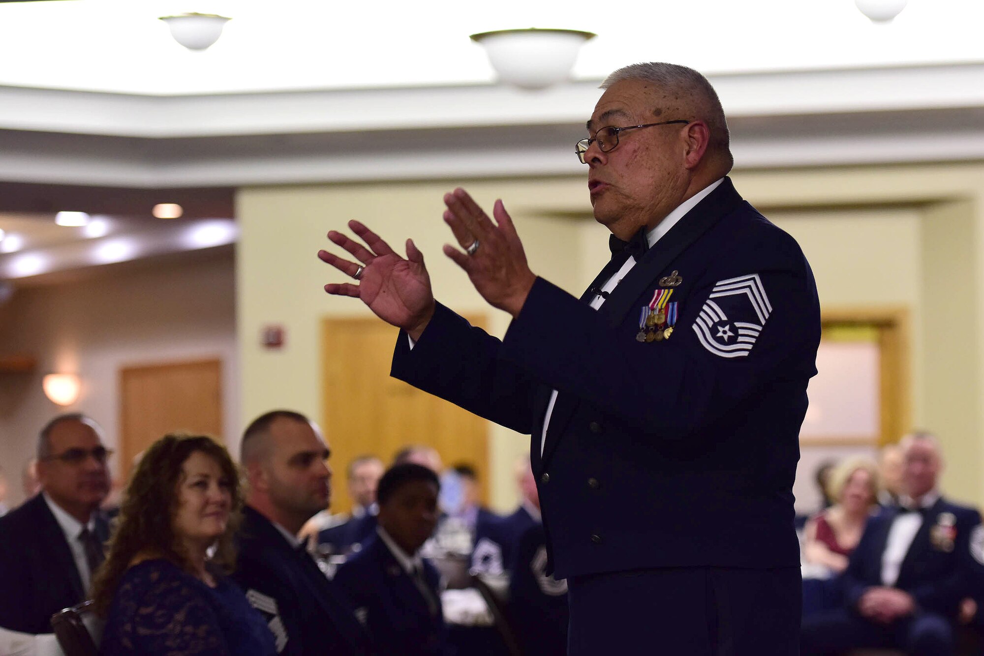 Retired U.S. Air Force Chief Master Sgt. Bob Vasquez, the guest speaker during Whiteman’s 2018 Chief Induction Ceremony, gives a speech about leadership and mentorship at Whiteman Air Force Base, Mo., March 16, 2018.