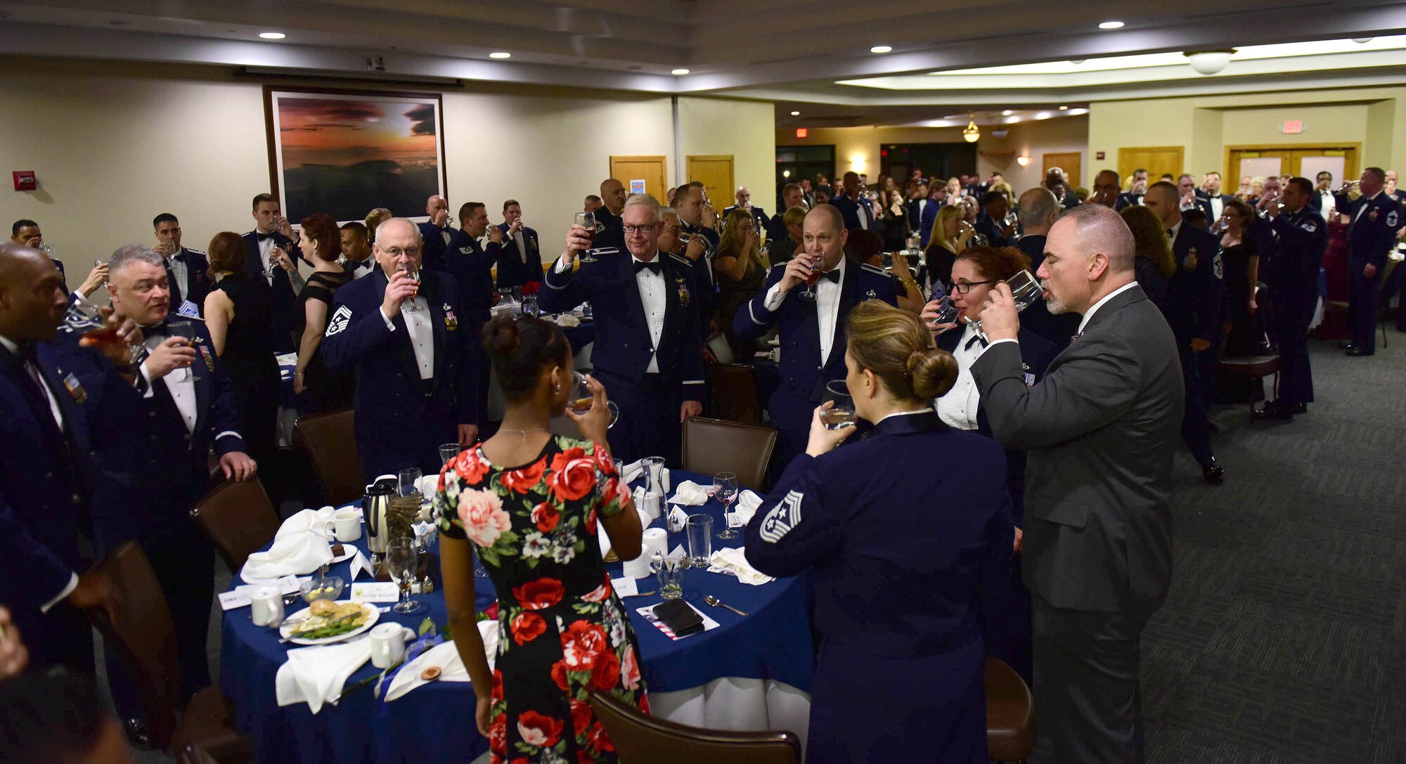 Members of Team Whiteman raise a toast to Whiteman’s six newest chief master sergeants during the 2018 Chief Induction Ceremony at Whiteman Air Force Base, Mo., March 16, 2018.