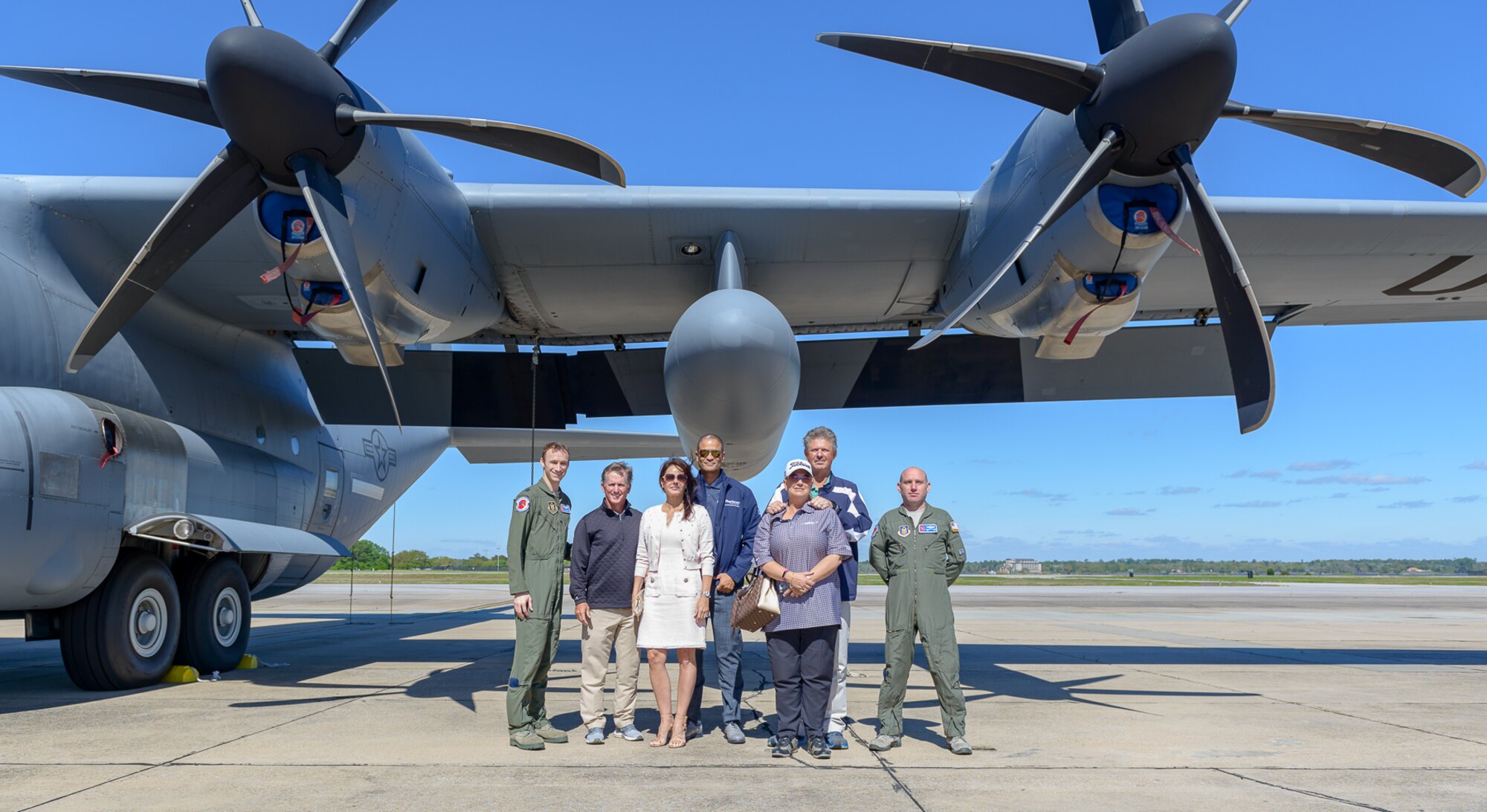 53rd Weather Reconnaissance Squadron pilots, Professional Golf Association Tour Champion players and the president of S2 Global Rapiscan Systems pose for a group photo in front of a WC-130J Super Hercules aircraft during the Rapiscan System Golf Classic players’ tour March 20, 2018, on Keesler Air Force Base, Mississippi. The attending golfers who are participating in the 2018 Rapiscan System Golf Classic also toured the military working dog kennel and received a Science on a Sphere demonstration. (U.S. Air Force photo by André Askew)
