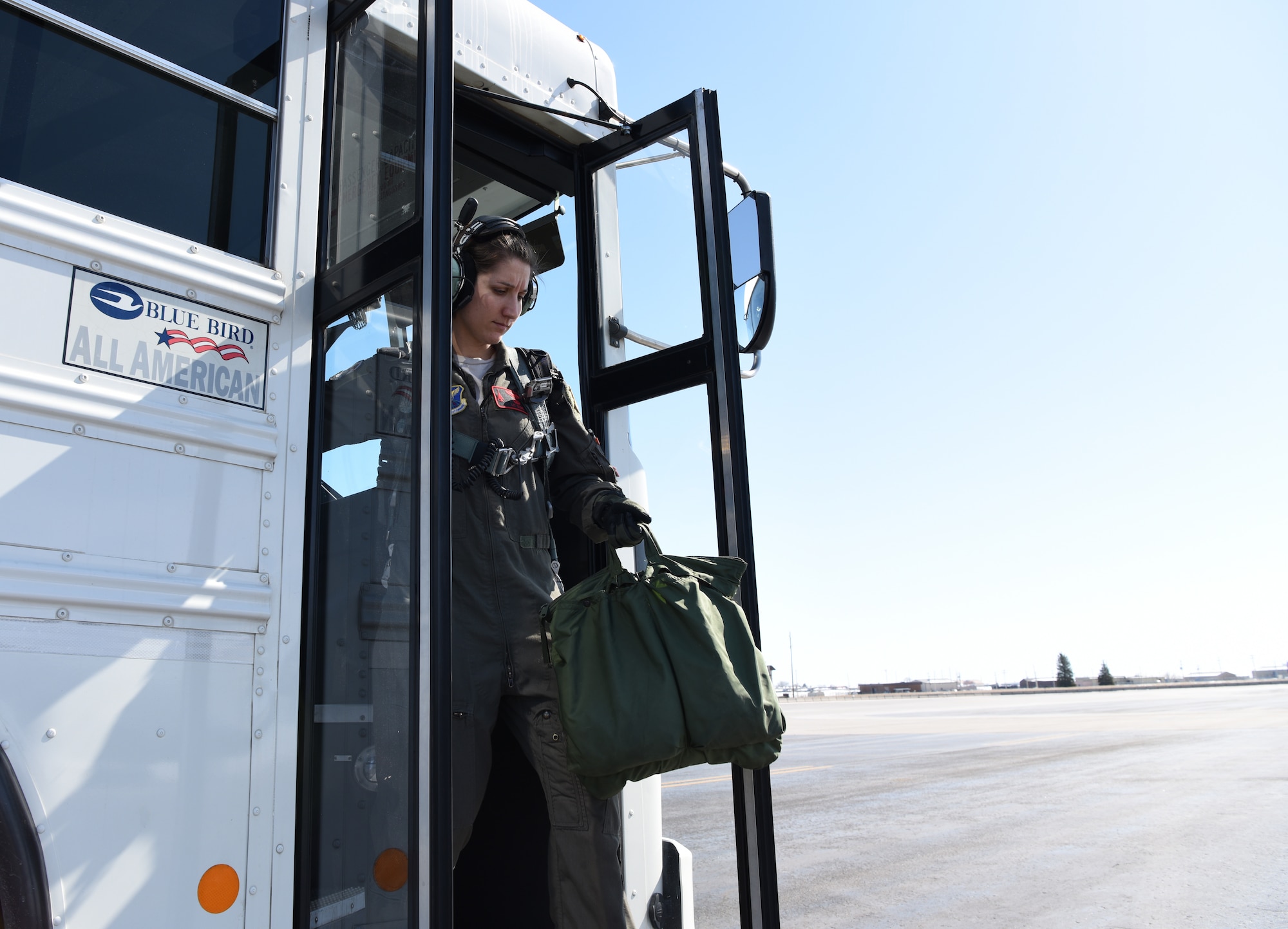 Capt. Lauren Olme, a 34th Bomb Squadron pilot, walks out to inspect her B-1 prior to an all-female flight out of Ellsworth Air Force Base, S.D., March 21, 2018. The flight was in honor of Women’s History Month and consisted of routine training in the local area. (U.S. Air Force photo by