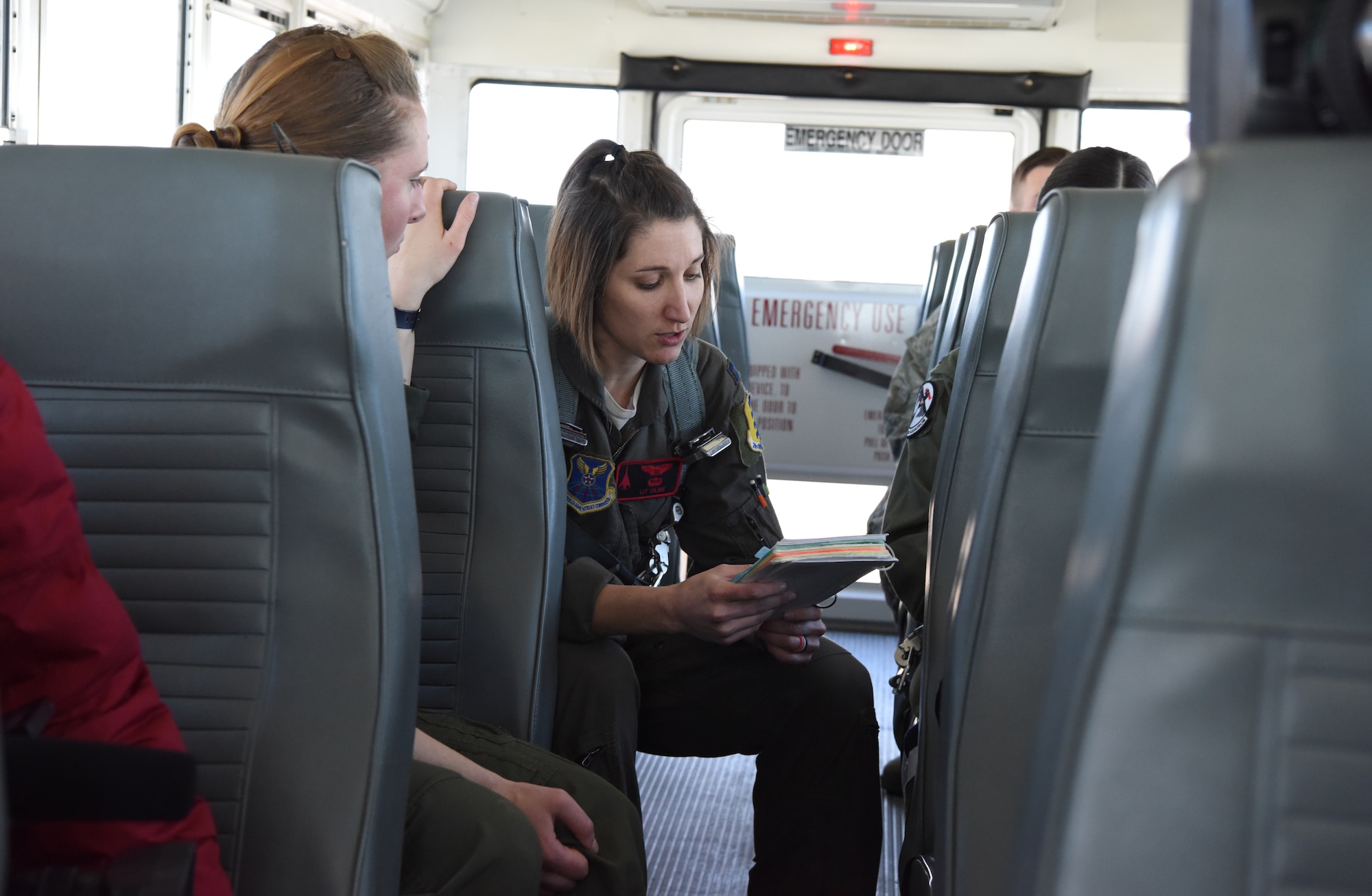 Capt. Danielle Zidack, a 34th Bomb Squadron weapon systems officer, and Capt. Lauren Olme, a 34th BS B-1 pilot, go over their checklists prior to an all-female flight out of Ellsworth Air Force Base, S.D., March 21, 2018. The flight was in honor of Women’s History Month and consisted of routine training in the local area. (U.S. Air Force photo by Staff Sgt. Jette Carr)
