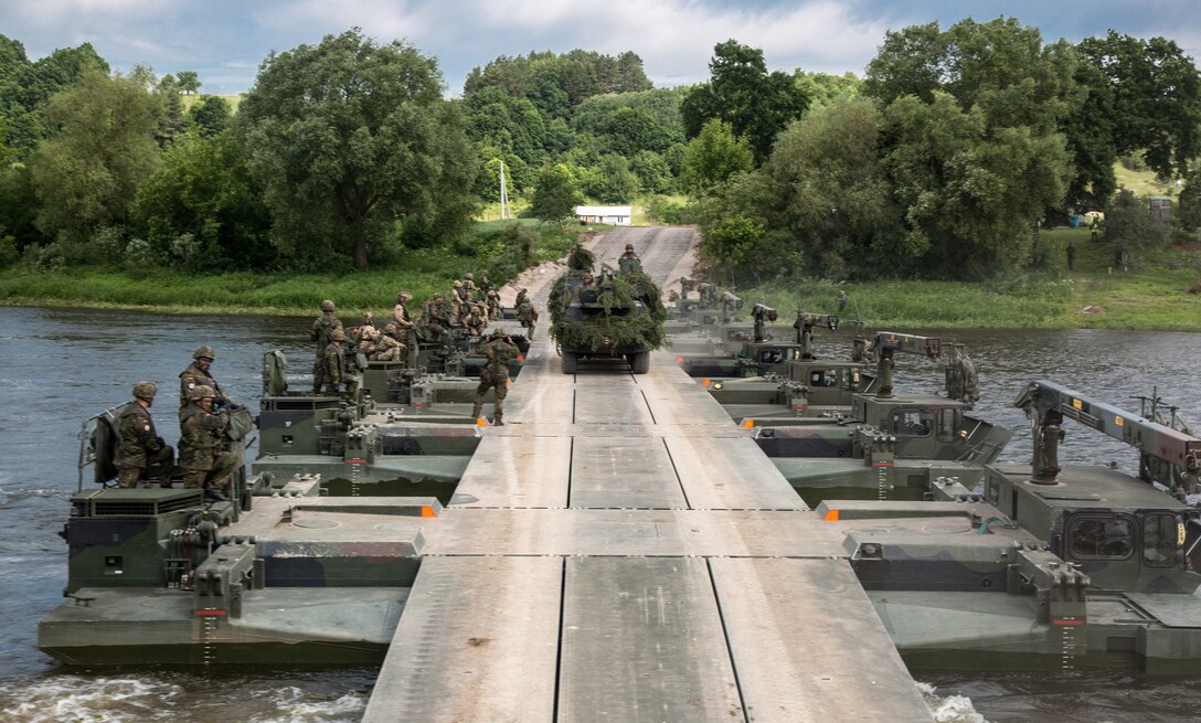 Battle Group Poland U.S. Soldiers and Lithuanian soldiers participate in a water crossing