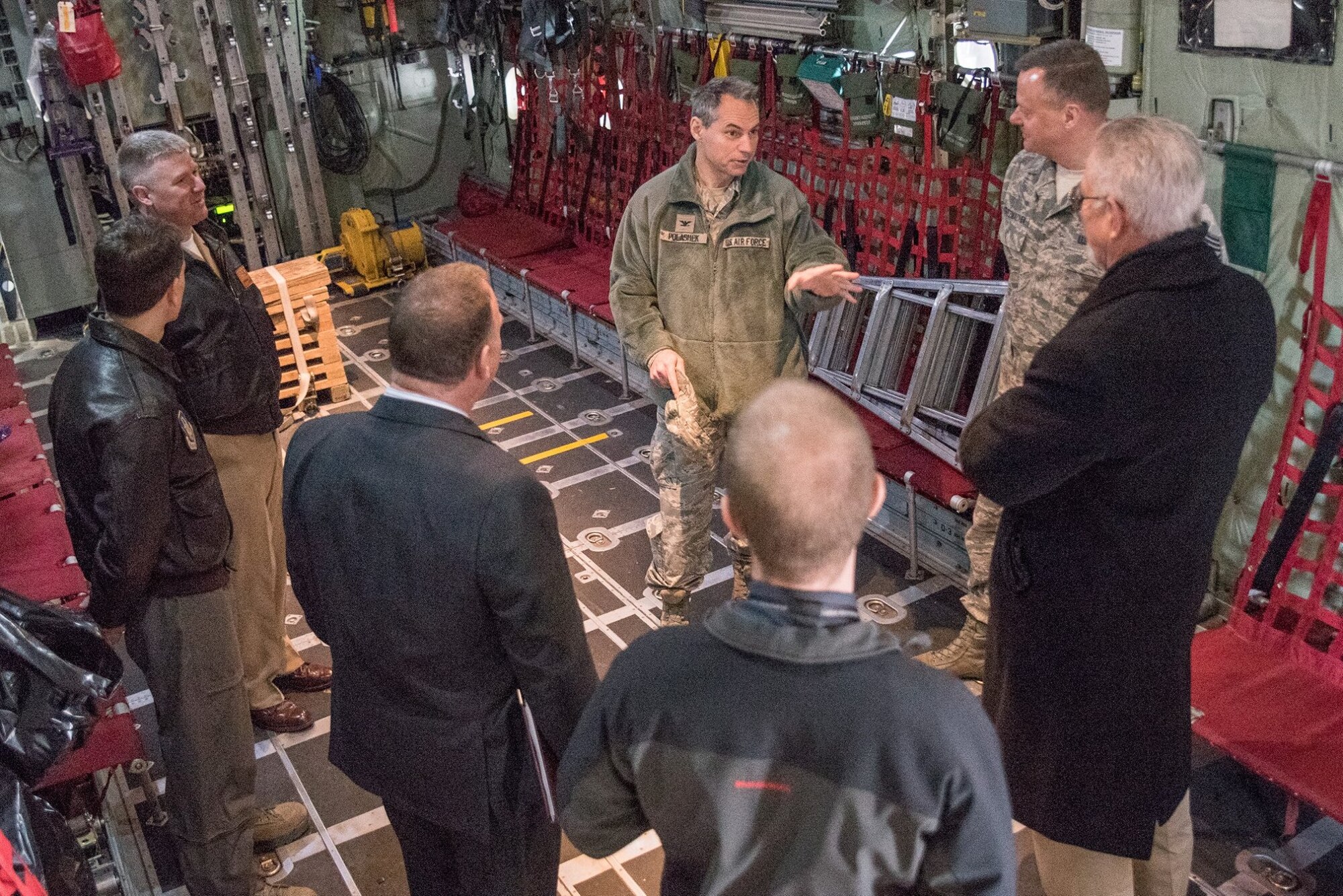 Col. Tony Polashek, 934th Airlift Wing commander, gives a tour of a C-130 aircraft as part of the Minnesota Federal Executive Board meeting March 8.  The board is made up of executives from federal agencies throughout the Minneapolis-St. Paul area. (Air Force Photo/MSgt. Eric Amidon)