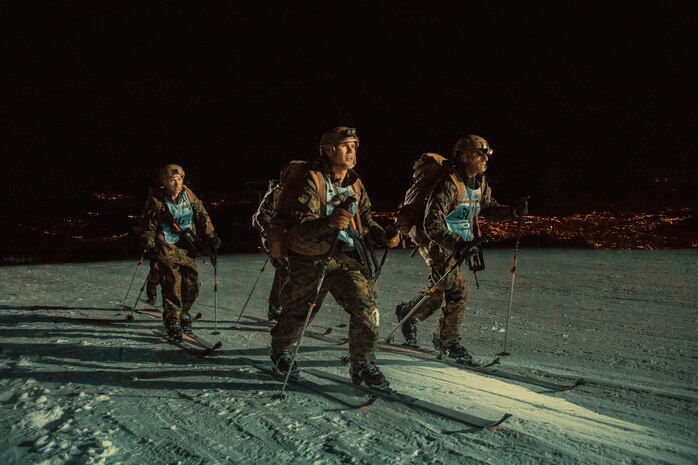 Marines from the Mountain Leaders Section, Mountain Warfare Training Center, Bridgeport, Calif., summit during the main touring event at the Mountain Troops Winter Challenge 2018, Chamrousse, France, March 14, 2018. "Team America" is one of six international teams participating in the competition of mountain infantry skills and tactics. (U.S. Marine Corps photo by Lance Cpl. Preston L. Morris)