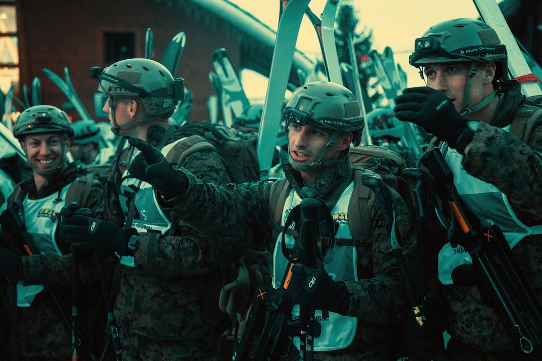 Marines from the Mountain Leaders Section, Mountain Warfare Training Center, Bridgeport, Calif., point out their course before the main touring event at the Mountain Troops Winter Challenge 2018, Chamrousse, France, March 14, 2018. "Team America" is one of six international teams participating in the competition of mountain infantry skills and tactics. (U.S. Marine Corps photo by Lance Cpl. Preston L. Morris)