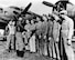 Capt. Robert Morgan, Memphis Belle pilot, thanking his ground crew.  (l to r) Cpl Oliver Champion, SSgt Max Armstrong, Sgt Ware Lipscomb, Sgt Leonard Sowers, Sgt Charles Blauser, Sgt Robert Walters, and crew chief MSgt Joseph Giambrone