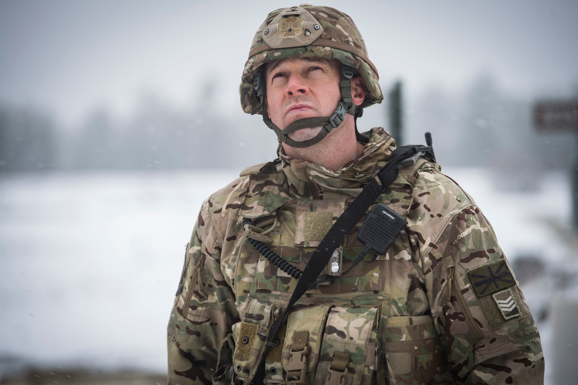 Tech. Sgt. Glenn Risebrow, 824th Base Defense Squadron flight chief, examines a defensive fighting position during a Mission Readiness Exercise, March 13, 2018, at Joint Base McGuire-Dix-Lakehurst, N.J. Evaluators tested the 824th BDS from Moody Air Force Base, Ga., and the 105th Security Forces Squadron from Stewart Air National Guard Base, N.Y., to ensure their combat readiness. (U.S. Air Force photo by Senior Airman Janiqua P. Robinson)