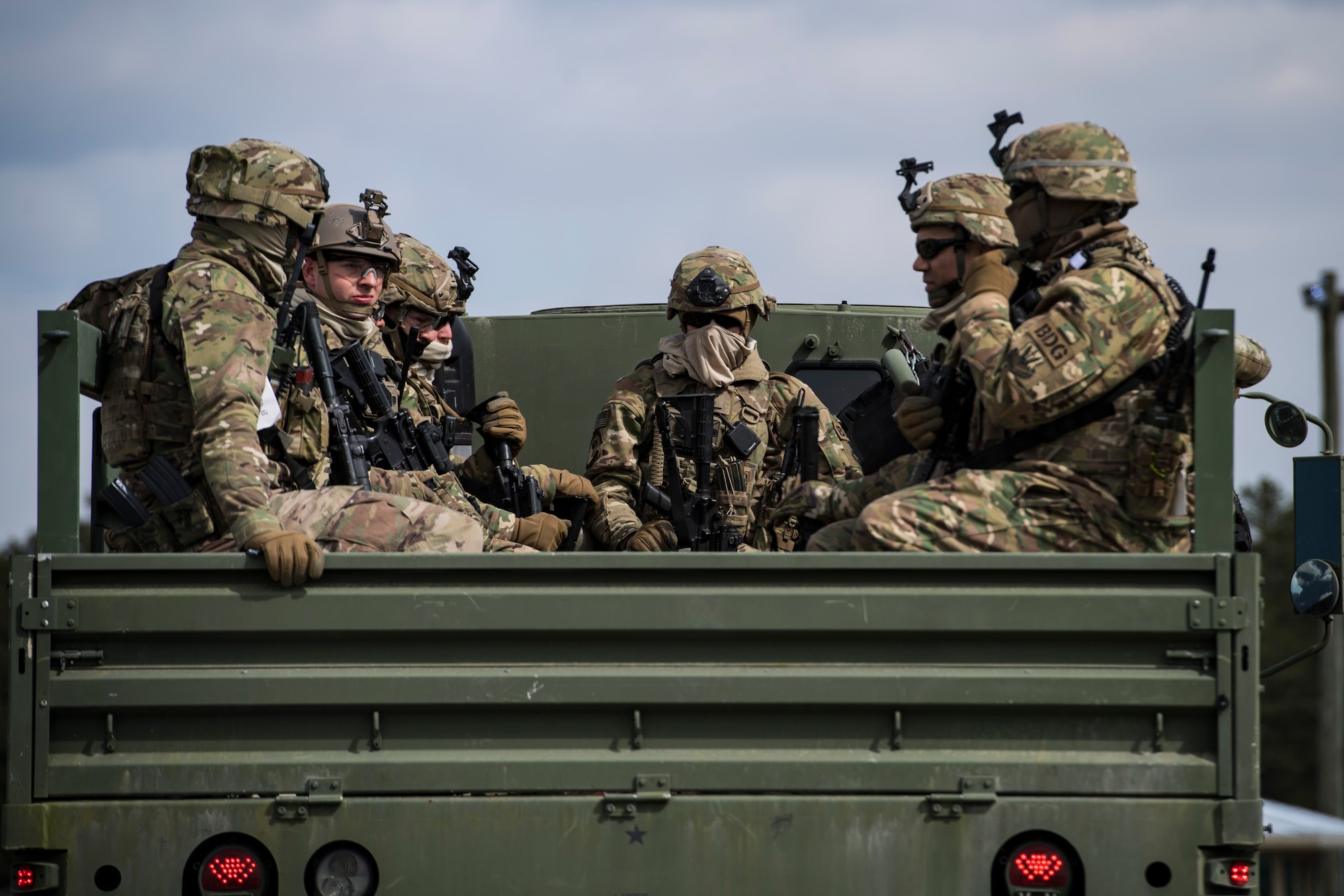 Airmen from the 824th Base Defense Squadron, prepare for a operation outside of their base during a Mission Readiness Exercise, March 13, 2018, at Joint Base McGuire-Dix Lakehurst, N.J. Evaluators tested the 824th BDS from Moody Air Force Base, Ga., and the 105th Security Forces Squadron from Stewart Air National Guard Base, N.Y., to ensure their combat readiness. (U.S. Air Force photo by Senior Airman Janiqua P. Robinson)