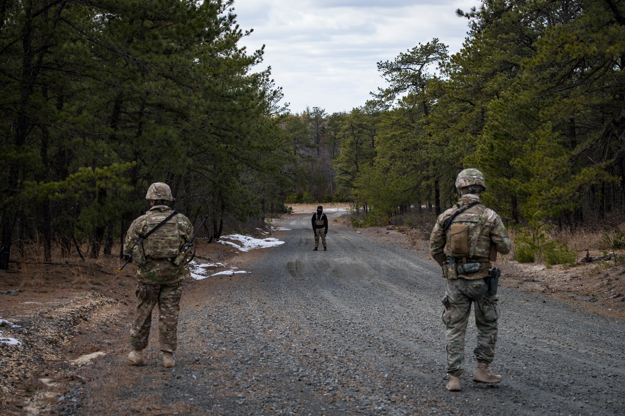Airmen from the 824th Base Defense Squadron confront a possible threat during a Mission Readiness Exercise, March 16, 2018, at Joint Base McGuire-Dix Lakehurst, N.J. Evaluators tested the 824th BDS from Moody Air Force Base, Ga., and the 105th Security Forces Squadron from Stewart Air National Guard Base, N.Y., to ensure their combat readiness. (U.S. Air Force photo by Senior Airman Janiqua P. Robinson)