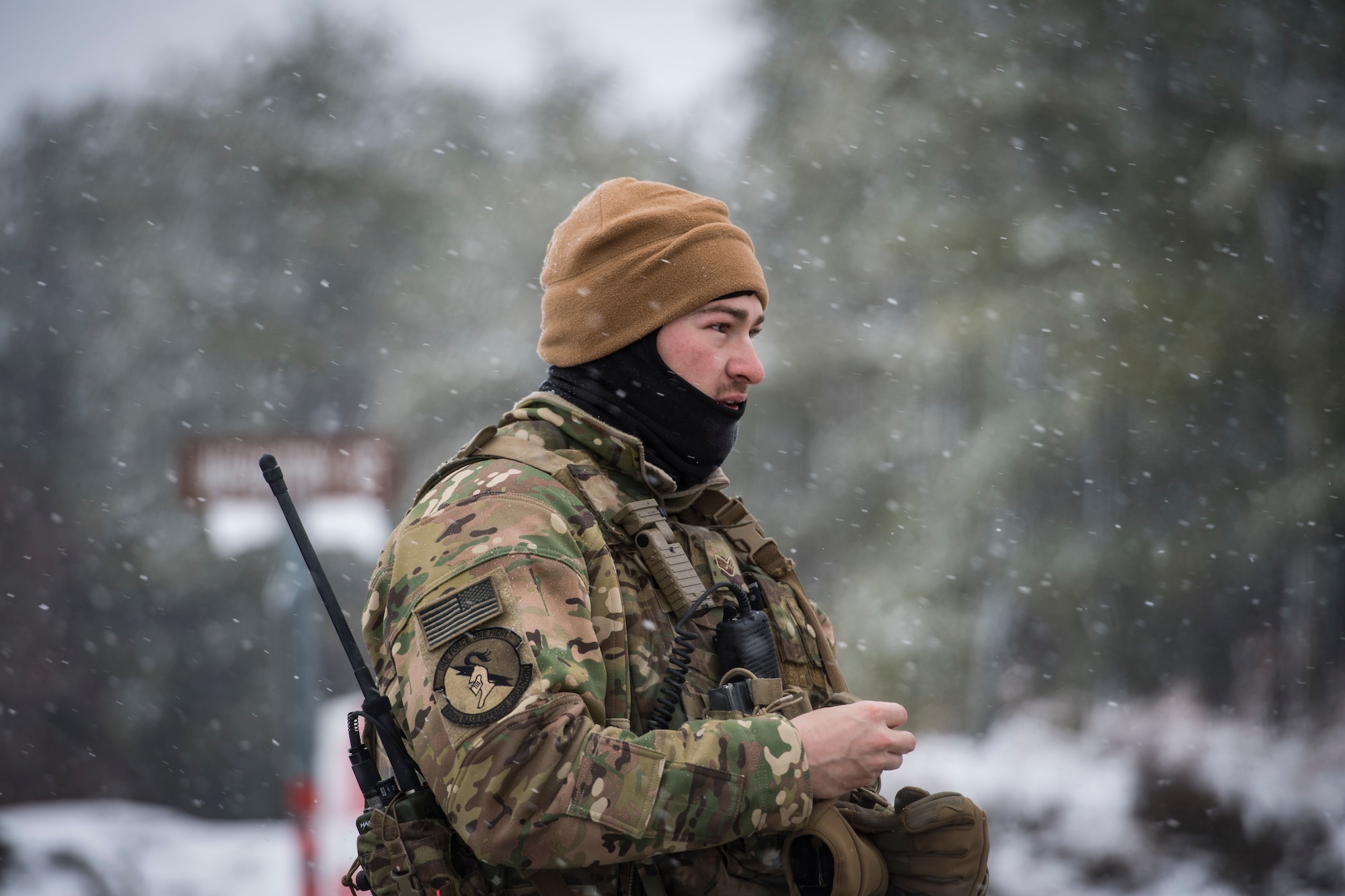 Senior Airman Ian Brown, 824th Base Defense Squadron fireteam member, walks in the snow during a Mission Readiness Exercise, March 13, 2018, at Joint Base McGuire-Dix Lakehurst, N.J. Evaluators tested the 824th BDS from Moody Air Force Base, Ga., and the 105th Security Forces Squadron from Stewart Air National Guard Base, N.Y., to ensure their combat readiness. (U.S. Air Force photo by Senior Airman Janiqua P. Robinson)
