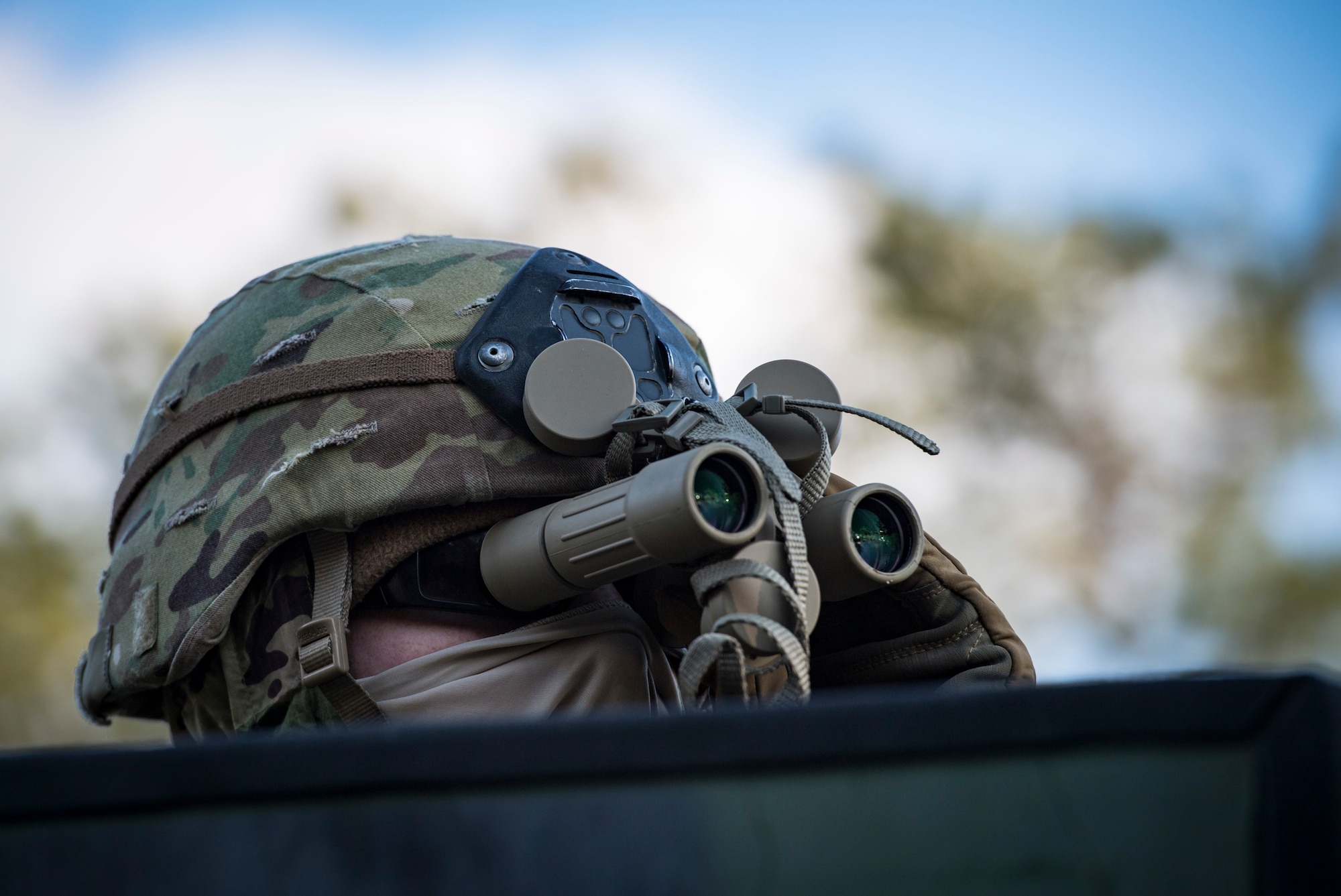 An Airman from the 824th Base Defense Squadron watches a threat during a Mission Readiness Exercise, March 16, 2018, at Joint Base McGuire-Dix Lakehurst, N.J. Evaluators tested the 824th BDS from Moody Air Force Base, Ga., and the 105th Security Forces Squadron from Stewart Air National Guard Base, N.Y., to ensure their combat readiness. (U.S. Air Force photo by Senior Airman Janiqua P. Robinson)