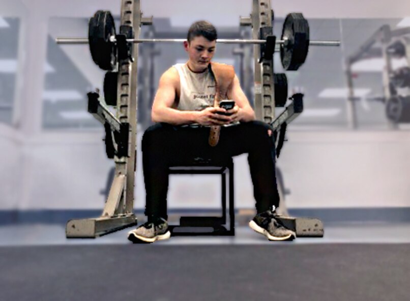 Airman 1st Class Jacob Davis, 14th Student Squadron aviation resource manager, relaxes after a lift March 21, 2018, on Columbus Air Force Base, Mississippi. Davis lost over 110 pounds to become a part of the world’s greatest Air Force, he worked on losing weight for his junior and senior year of high school and enlisted after graduation. (U.S. Air Force photo illustration by Airman 1st Class Keith Holcomb)