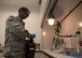 Senior Airman Matthew Boyles, a fuels laboratory technician assigned to the 97th Logistics Readiness Squadron, prepares to test a sample of aircraft fuel, Feb. 21, 2018, at Altus Air Force Base, Okla. Members of the fuels lab perform quality analysis on petroleum products by checking for a variety of possible issues like contamination and the conductivity of the fuel. (U.S. Air Force photo by Senior Airman Kirby Turbak)