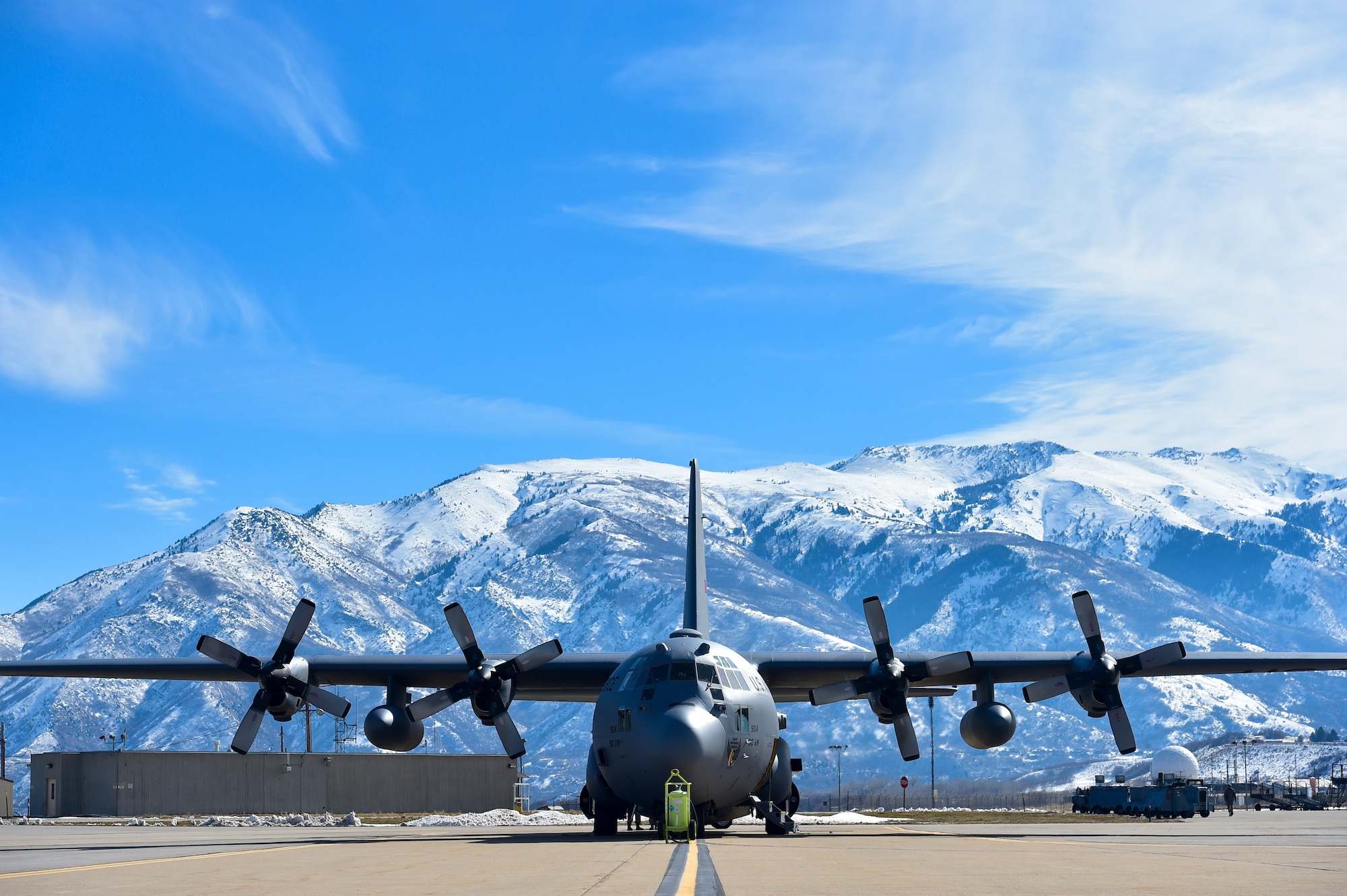 A 910th Airlift Wing C-130H Hercules sits on the ramp at Hill Air Force Base (AFB), Utah, March 7, 2018 during an aerial spray mission.