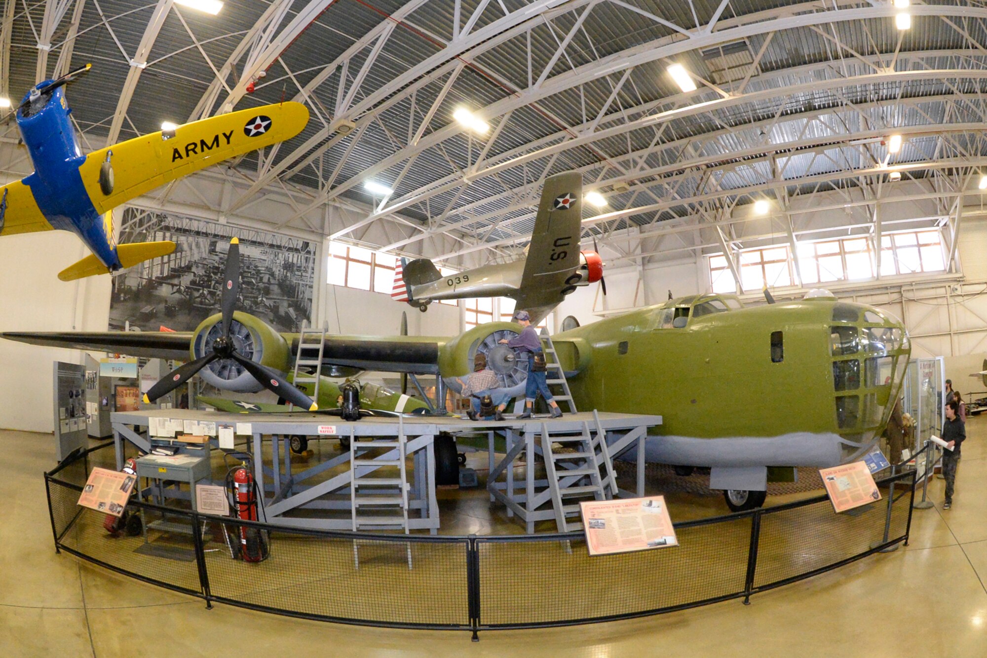 A B-24 bomber sits on display inside the Hill Aerospace Museum at Hill Air Force Base, Utah, March 13, 2018. The aircraft was in service during World War II, and crashed in the Aleutian Islands of Alaska. It was recovered and restored by the Aerospace Heritage Foundation of Utah. (U.S. Air Force photo by Todd Cromar)