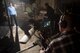 Michael McCool operates a camera as Burke Baker directs actor Aimee Lynn Chadwick while she narrates a portion of the Air Force Space Command’s production, “Space Superiority." (U.S. Air Force photo by Staff Sgt. Andrew Lee)