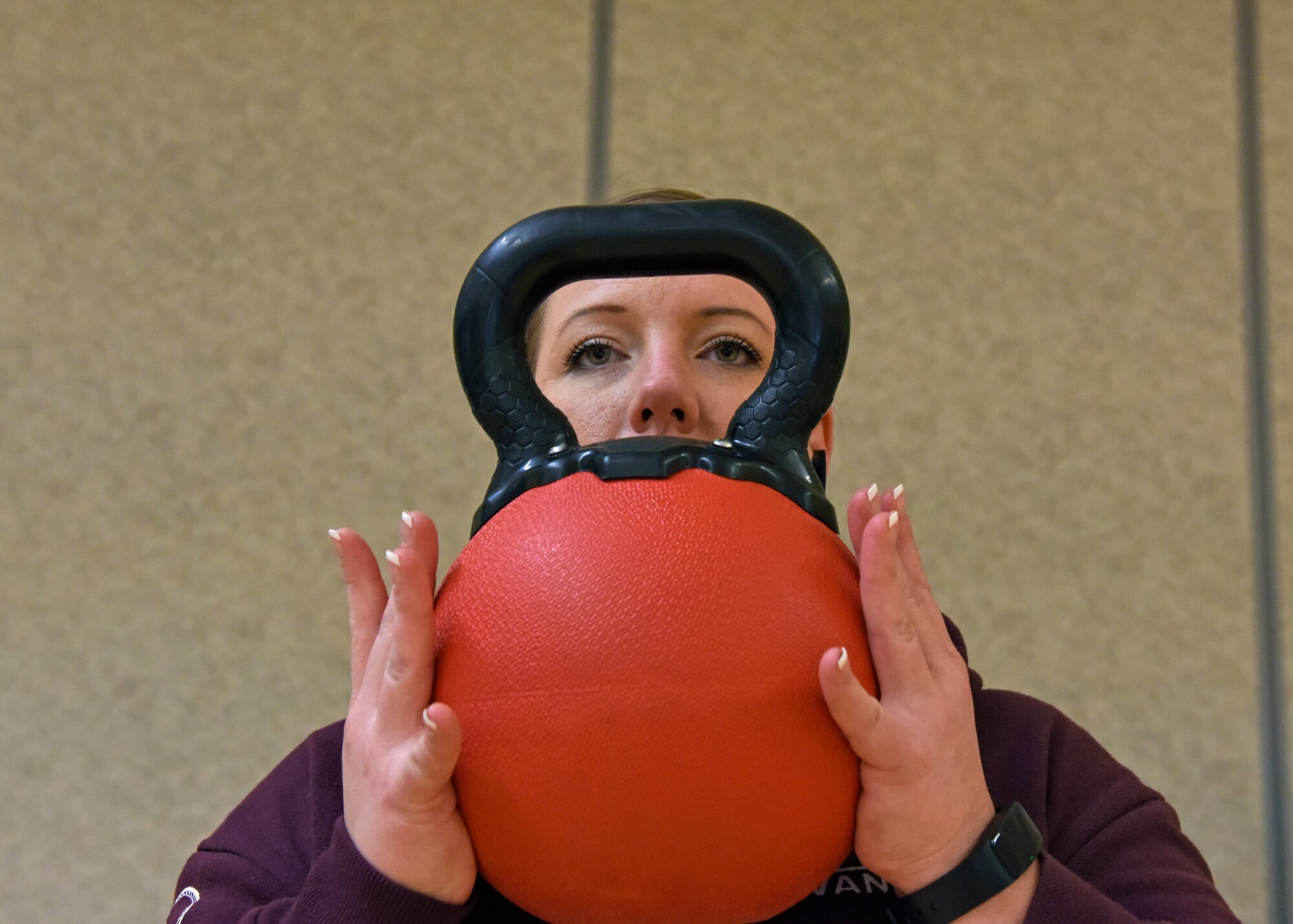 Staff Sgt. Jamie Skrainka, 92nd Maintenance Squadron Human Performance Cell patient, performs a weighted step-up at Fairchild Air Force Base, Washington, Feb. 21, 2018. The HPC program targets the recovery and healing of injured Airmen, and focuses on performance optimization and preventing future injuries. (U.S. Air Force photo/Airman 1st Class Jesenia Landaverde)