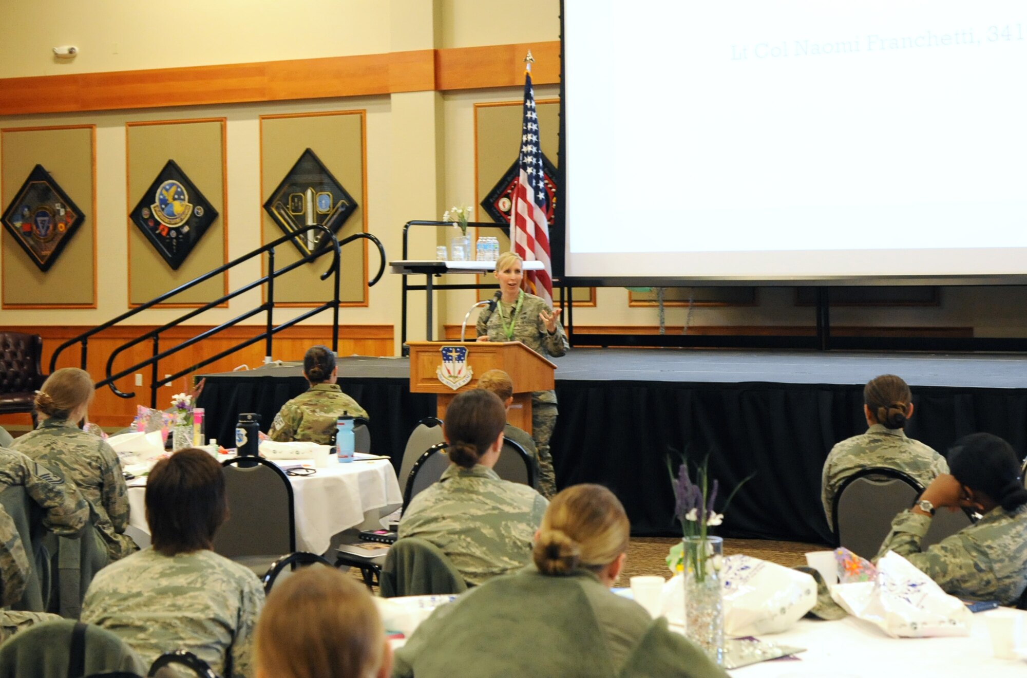 Lt. Col. Naomi Franchetti, 341st Missile Maintenance Squadron commander, talks about adversities she had to overcome while trying to balance military duty with personal life during a women’s symposium March 20, 2018, at Malmstrom Air Force Base, Mont. The two-day event was geared toward educating, enhancing communication and building leadership and unity across the military and local community. (U.S. Air Force photo by Christy Mason)