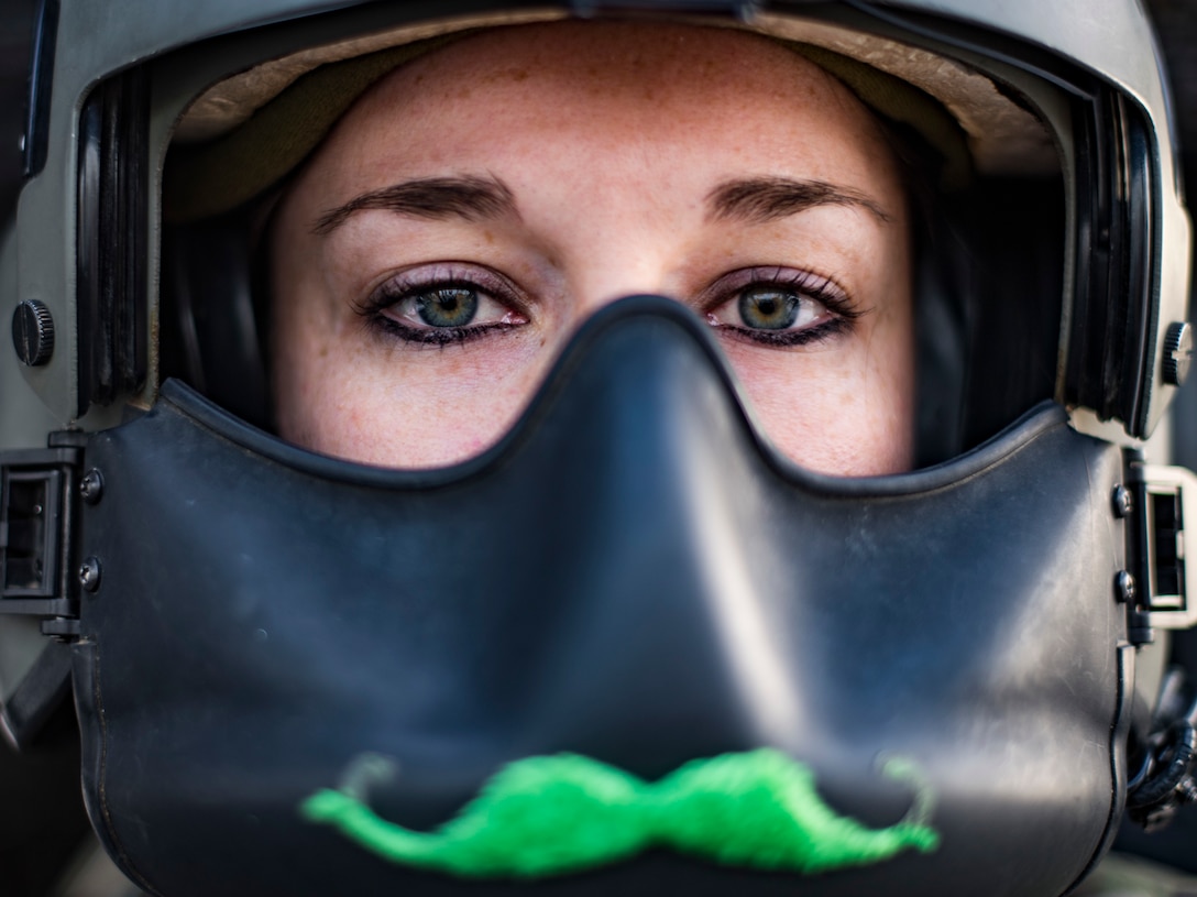 U.S. Air Force Capt. Victoria Snow, HH-60G Pave Hawk pilot, assigned to the 33rd Expeditionary Rescue Squadron, sits in the cockpit before a training mission with a Guardian Angel team assigned to the 308th ERQS, Kandahar Airfield, Afghanistan in support of Operations Freedom's Sentinel and Resolute Support, March 13, 2018. The Guardian Angel Teams, consisting of combat rescue officers and pararescuemen work with the HH-60G aircrews to constantly maintain the highest levels of proficiency to ensure the successful execution of the personnel recovery/casualty evacuation mission set. (U.S. Air Force Photo by Tech. Sgt. Gregory Brook)