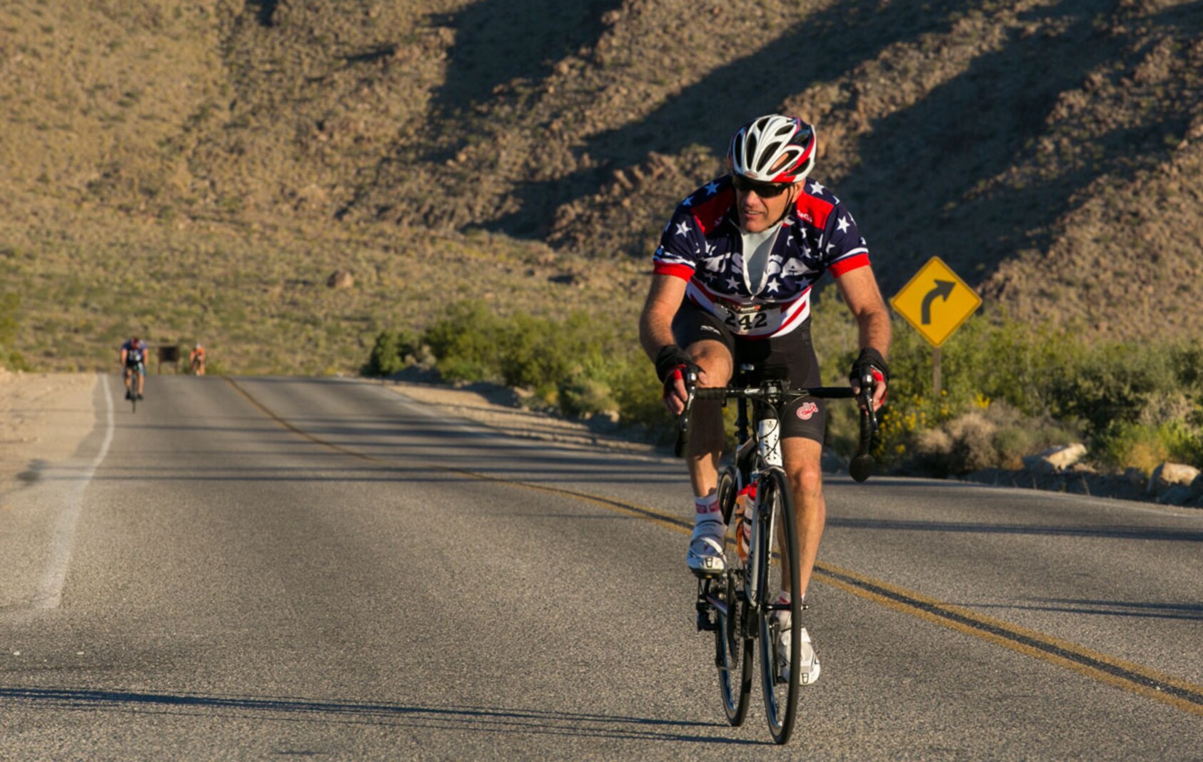 Riders travel through Joshua Tree National Park to celebrate Earth Day during the park to Park Ride, an annual event hosted by Environmental Affairs.